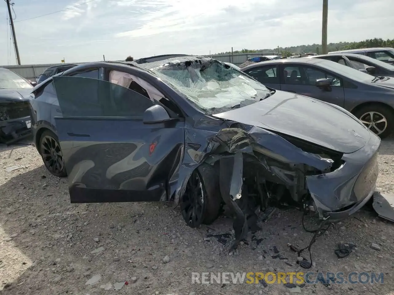 4 Photograph of a damaged car 7SAYGDEE4NA019623 TESLA MODEL Y 2022