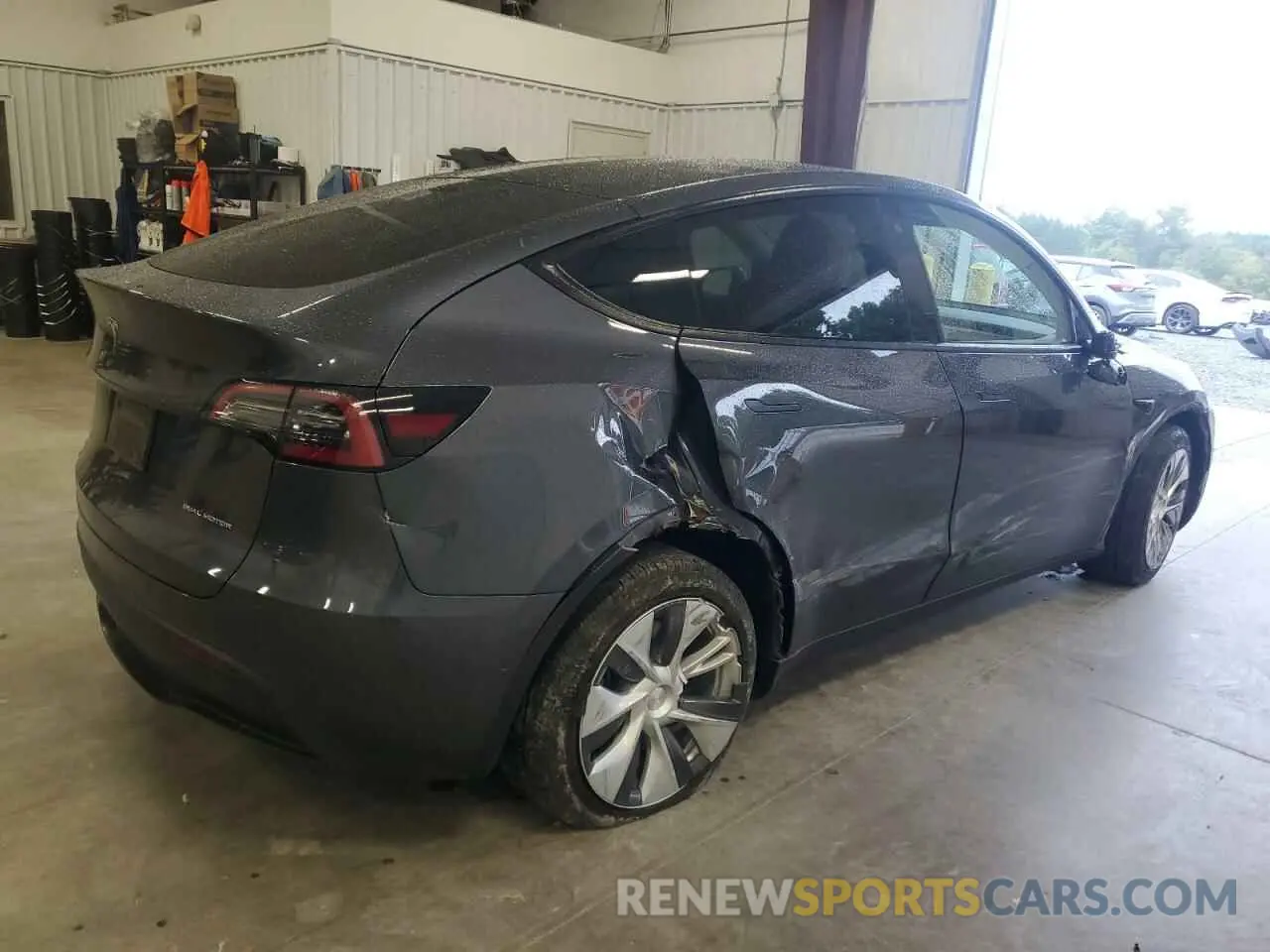 3 Photograph of a damaged car 7SAYGDEEXNA005385 TESLA MODEL Y 2022