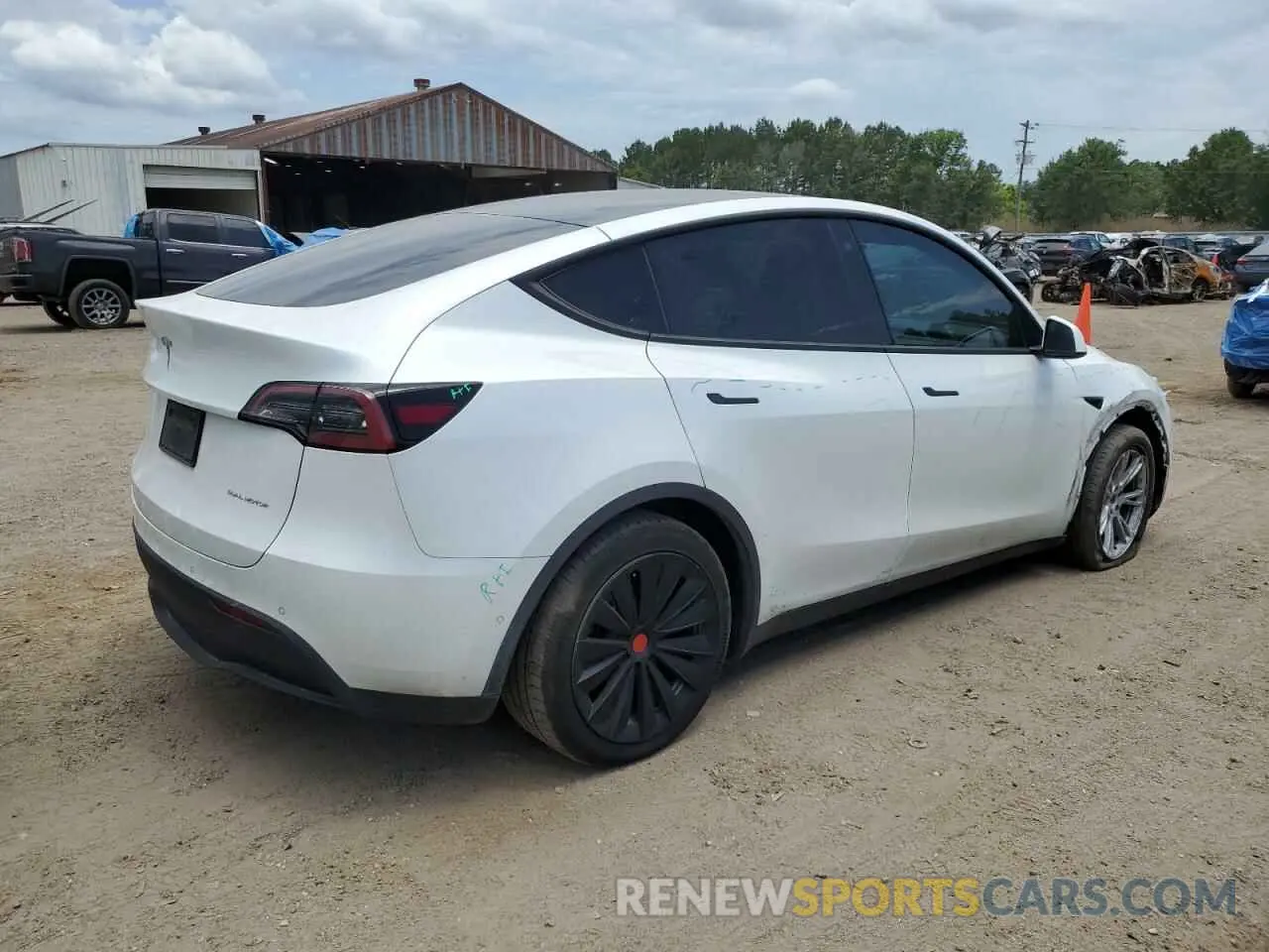 3 Photograph of a damaged car 7SAYGDEEXNA011879 TESLA MODEL Y 2022