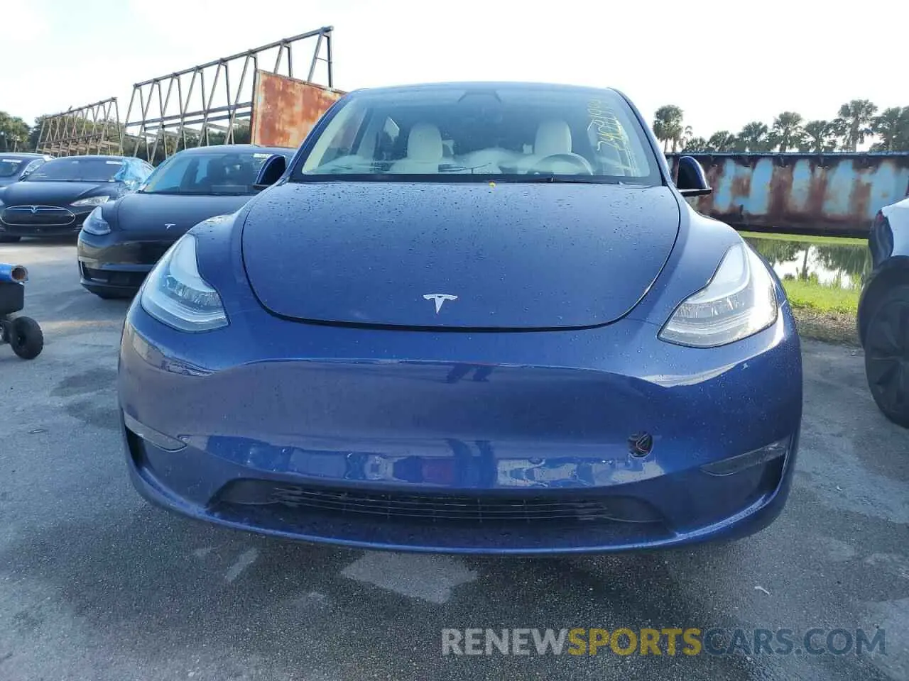 5 Photograph of a damaged car 7SAYGDEEXNF310825 TESLA MODEL Y 2022