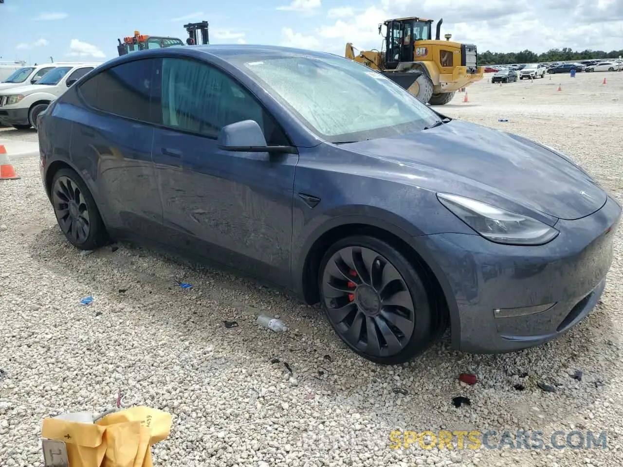 4 Photograph of a damaged car 7SAYGDEF0NF376986 TESLA MODEL Y 2022