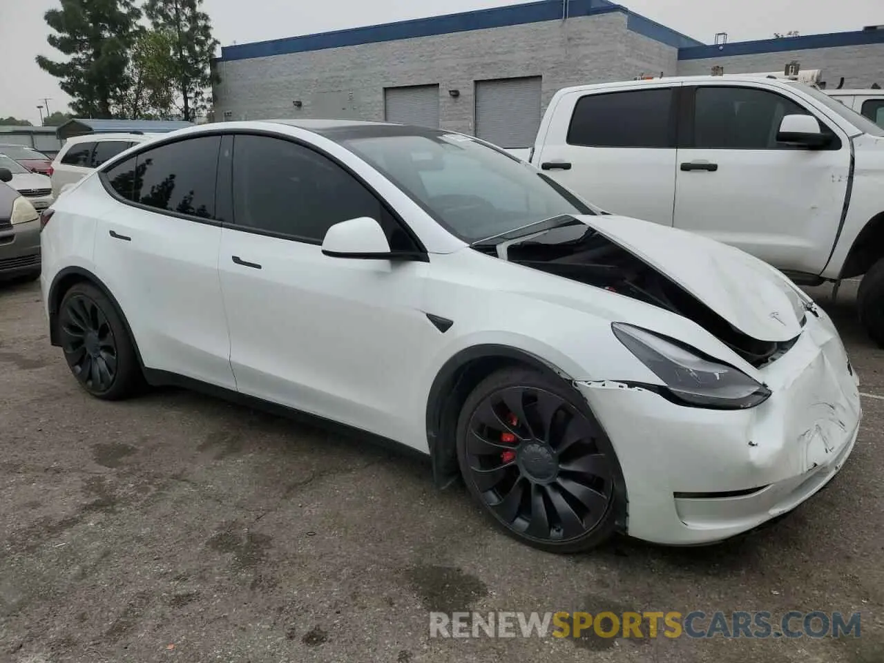 4 Photograph of a damaged car 7SAYGDEF1NF406397 TESLA MODEL Y 2022