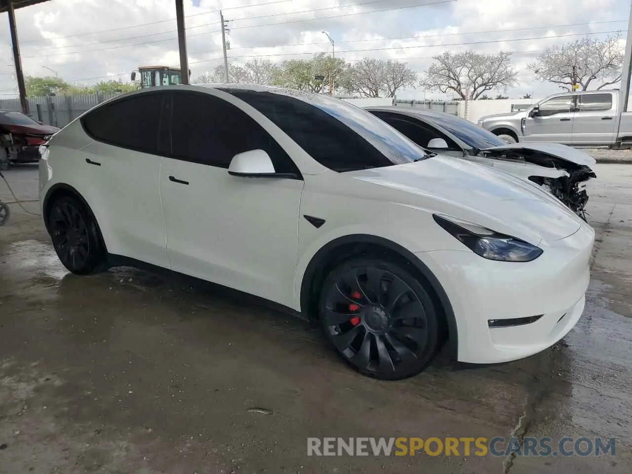 4 Photograph of a damaged car 7SAYGDEF1NF454045 TESLA MODEL Y 2022