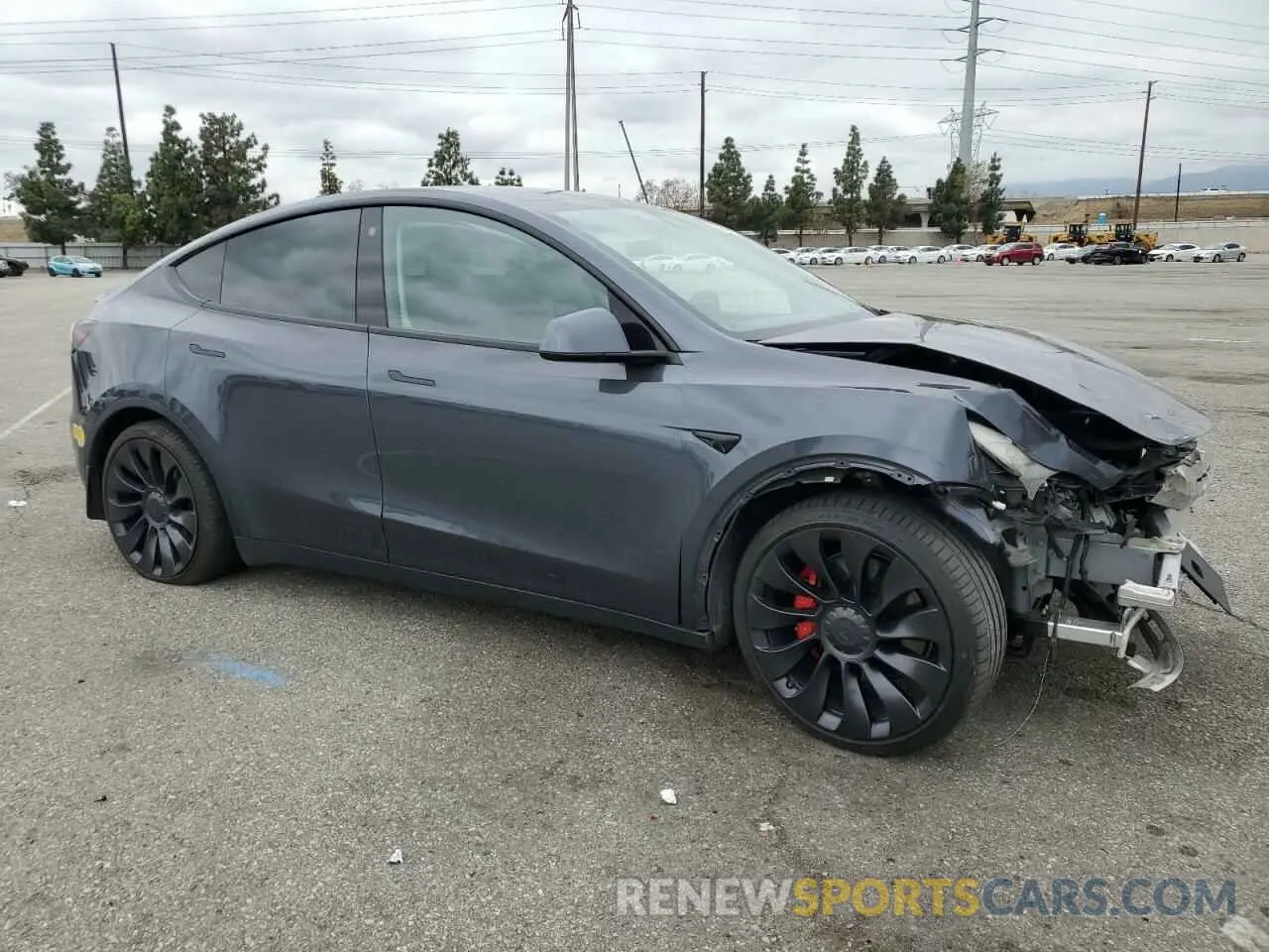 4 Photograph of a damaged car 7SAYGDEF3NF410242 TESLA MODEL Y 2022
