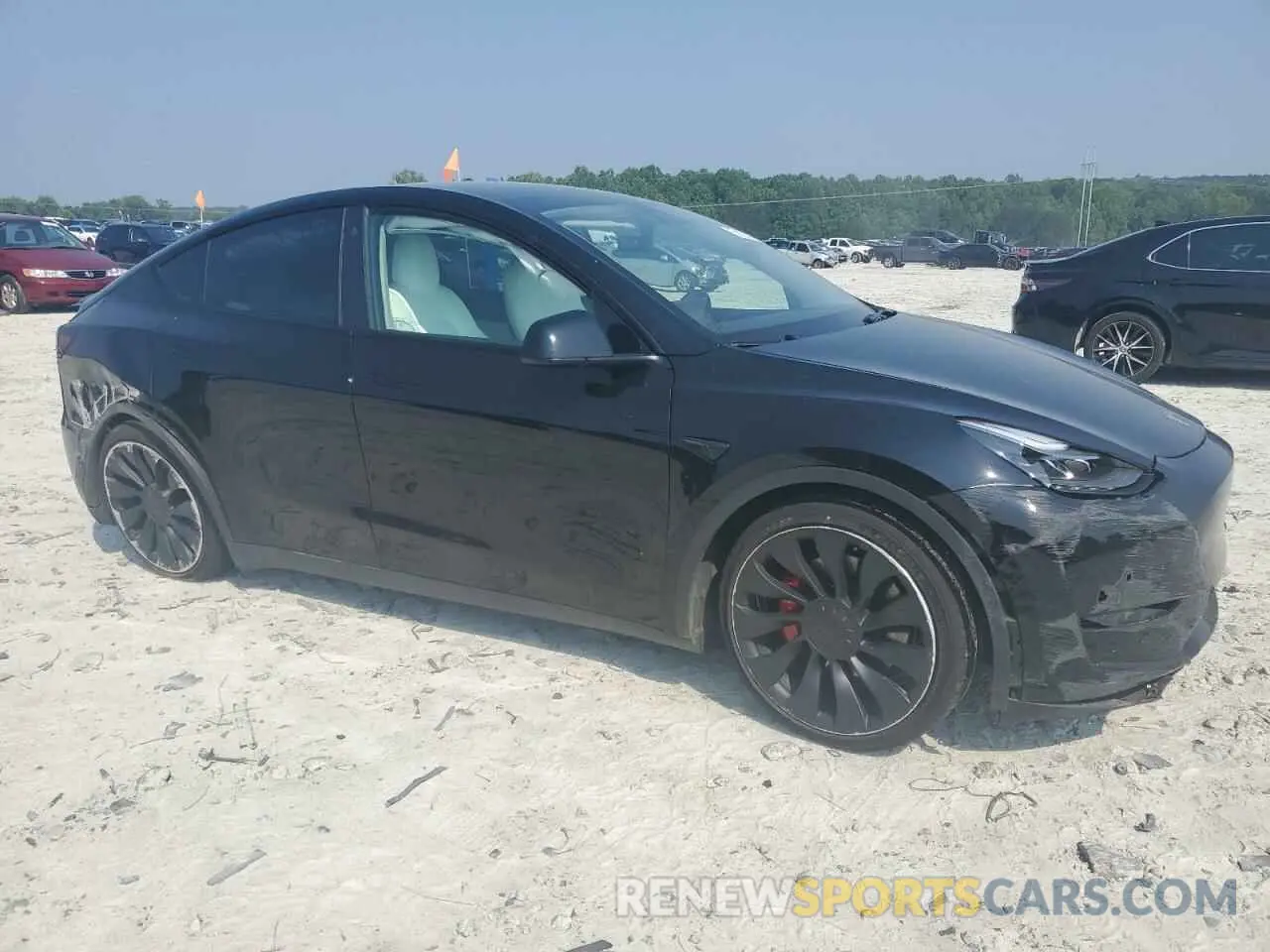 4 Photograph of a damaged car 7SAYGDEF5NF344292 TESLA MODEL Y 2022
