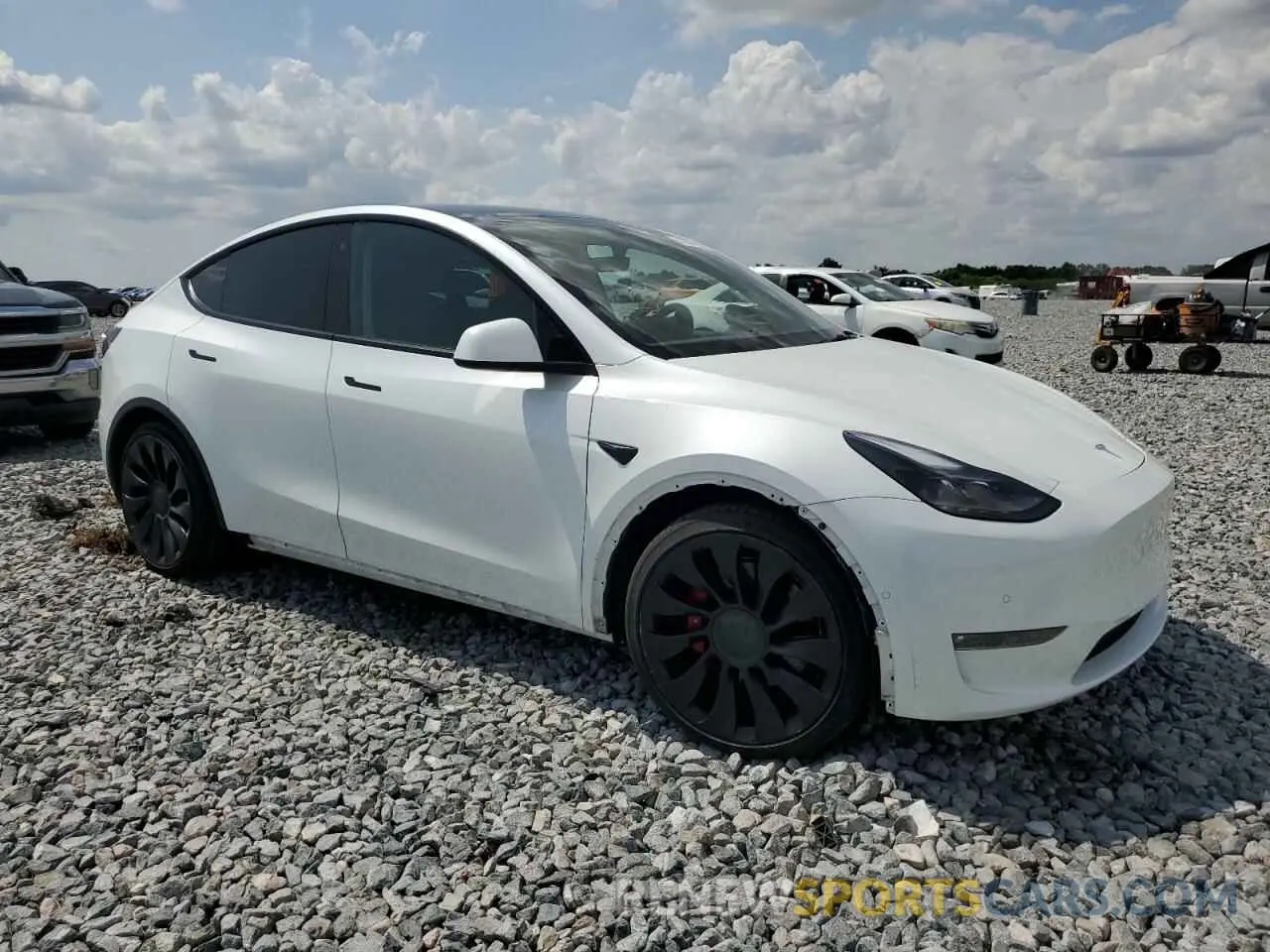 4 Photograph of a damaged car 7SAYGDEF8NF469285 TESLA MODEL Y 2022