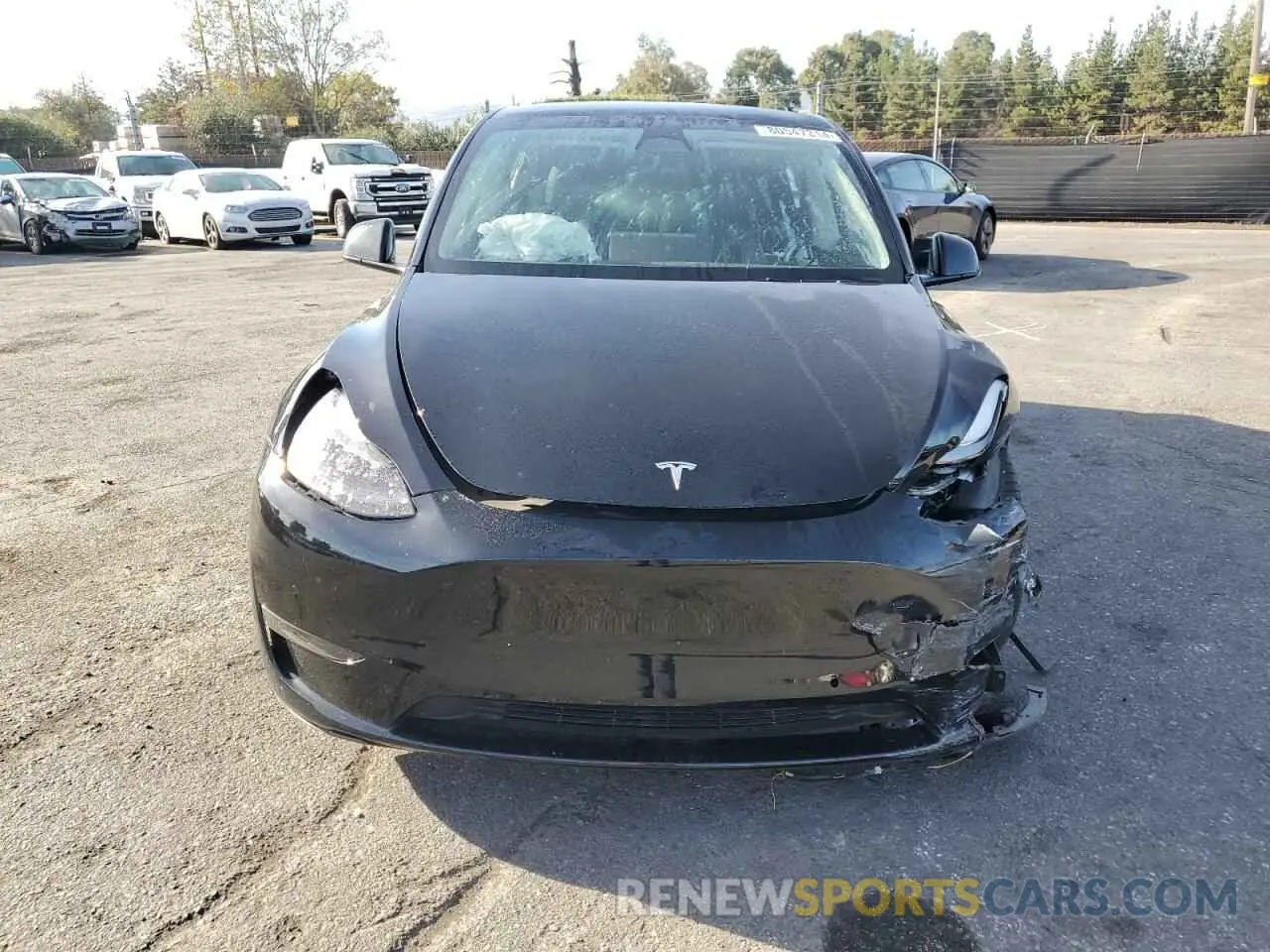 5 Photograph of a damaged car 7SAYGDEFXNF390779 TESLA MODEL Y 2022
