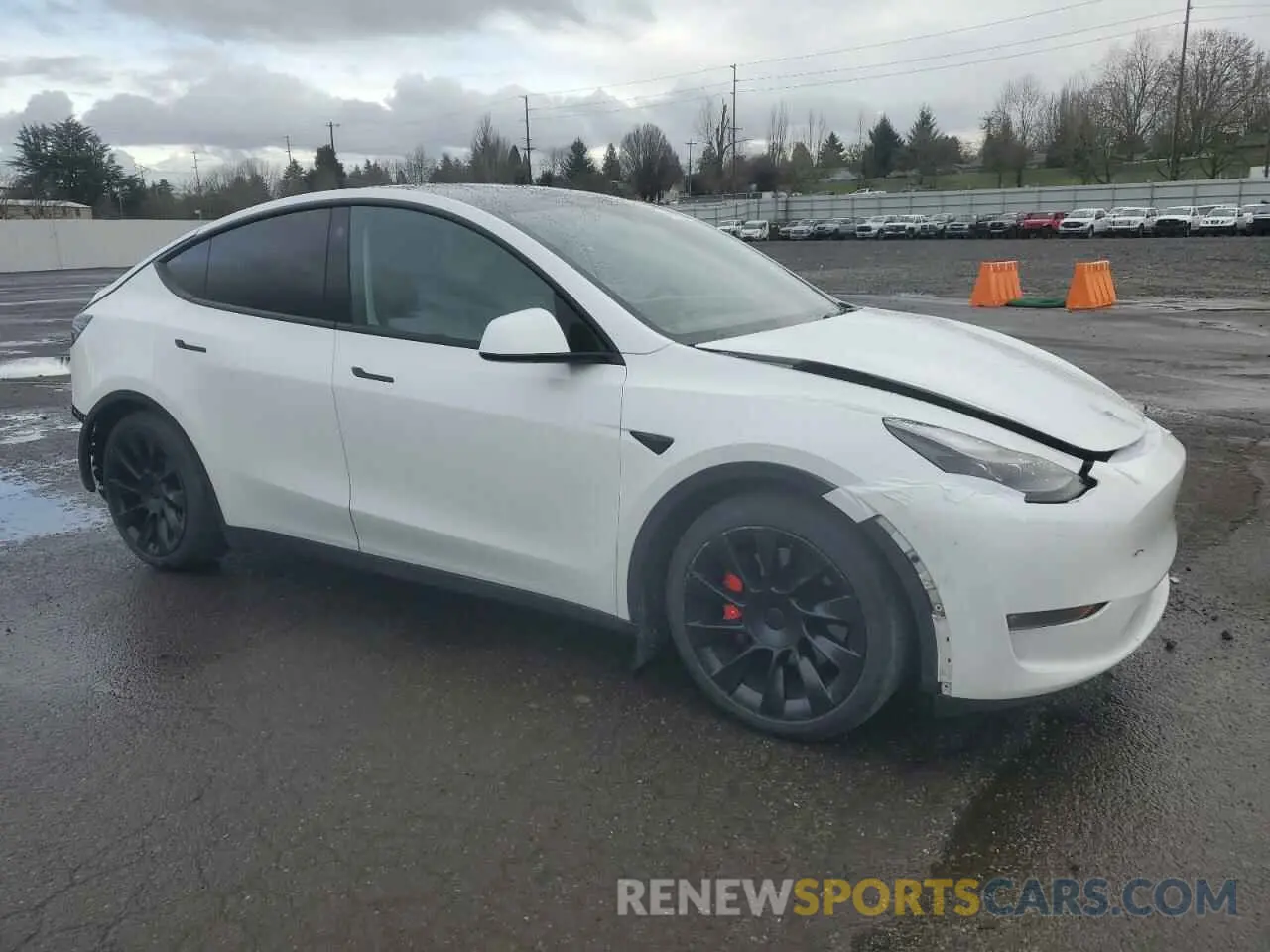 4 Photograph of a damaged car 7SAYGDEFXNF455517 TESLA MODEL Y 2022