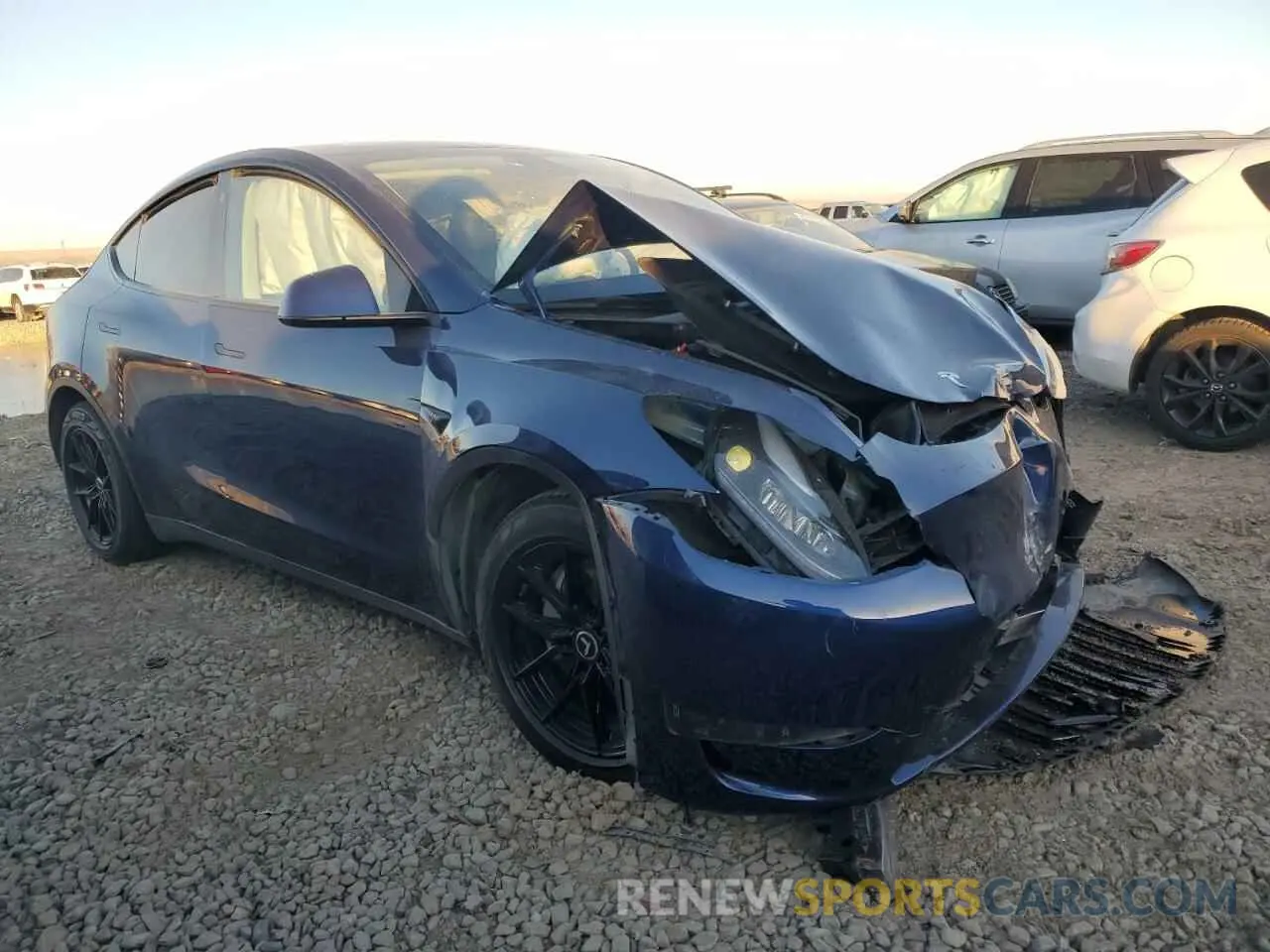 4 Photograph of a damaged car 7SAYGAEE0PF627921 TESLA MODEL Y 2023