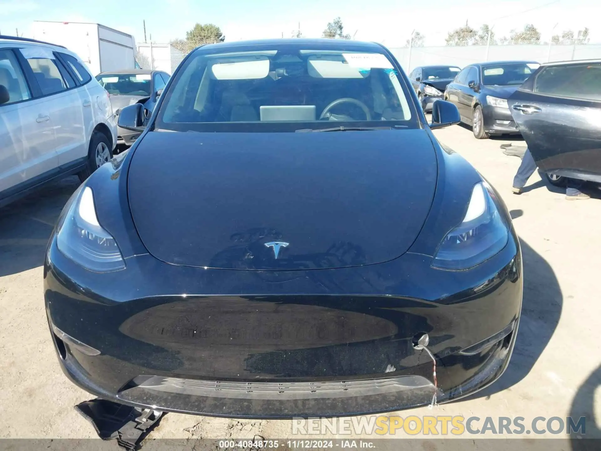12 Photograph of a damaged car 7SAYGAEE0PF868345 TESLA MODEL Y 2023
