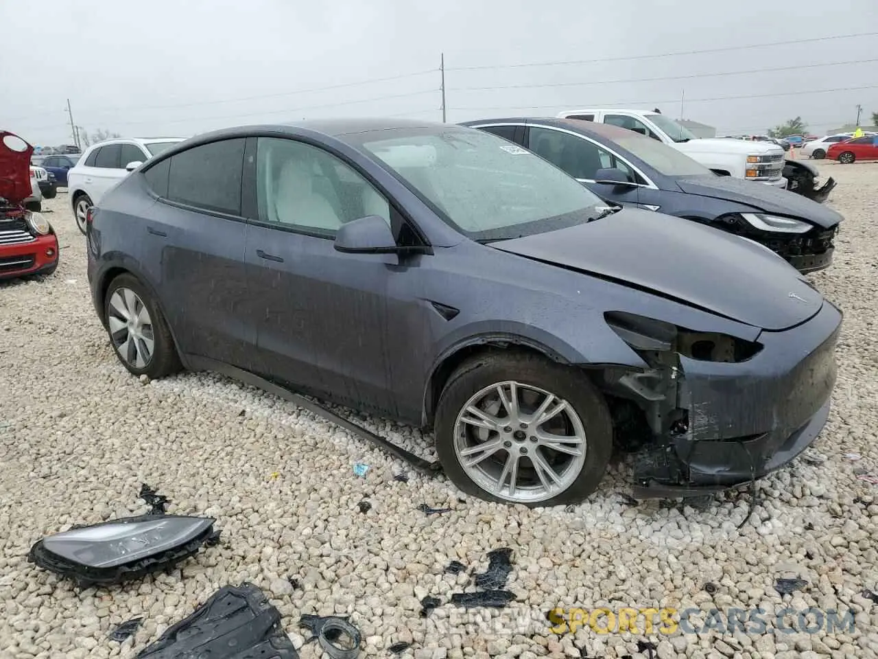 4 Photograph of a damaged car 7SAYGAEE0PF890667 TESLA MODEL Y 2023