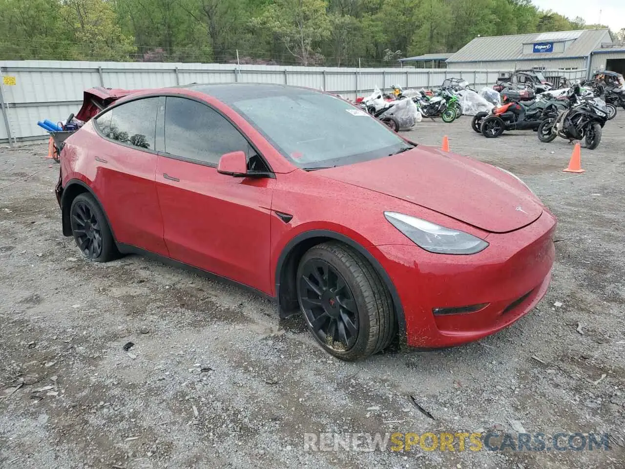4 Photograph of a damaged car 7SAYGAEE1PF690008 TESLA MODEL Y 2023
