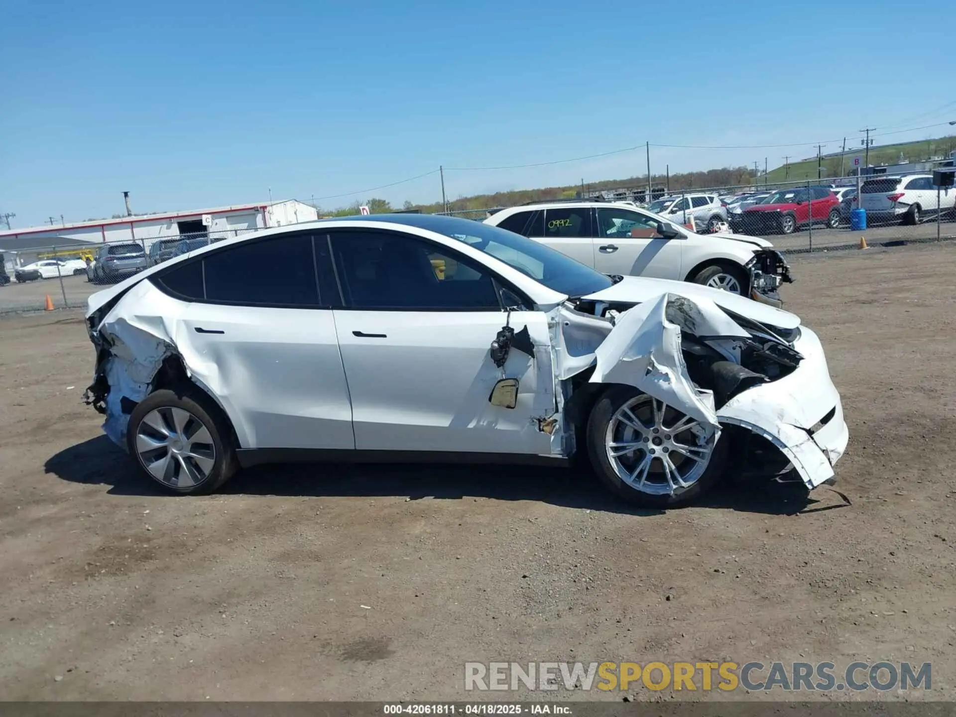13 Photograph of a damaged car 7SAYGAEE2PF839171 TESLA MODEL Y 2023
