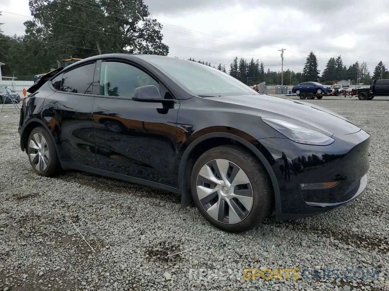 4 Photograph of a damaged car 7SAYGAEE2PF945975 TESLA MODEL Y 2023