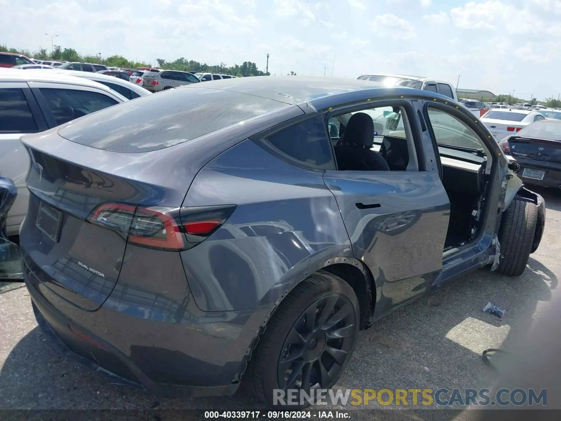 4 Photograph of a damaged car 7SAYGAEE4PF882782 TESLA MODEL Y 2023