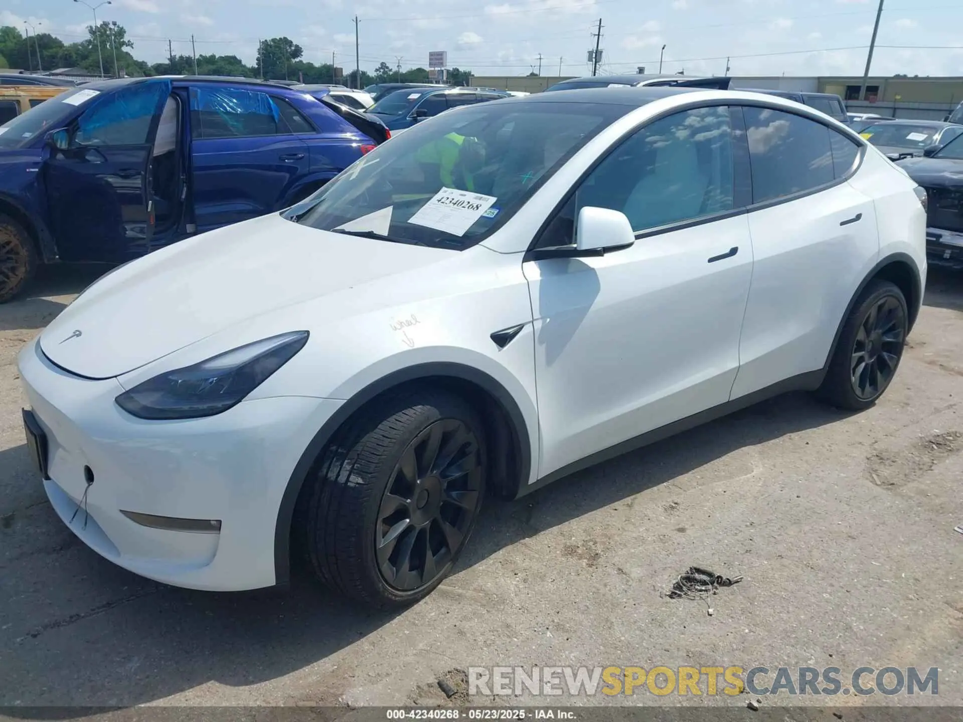 2 Фотография поврежденного автомобиля 7SAYGAEE4PF885925 TESLA MODEL Y 2023