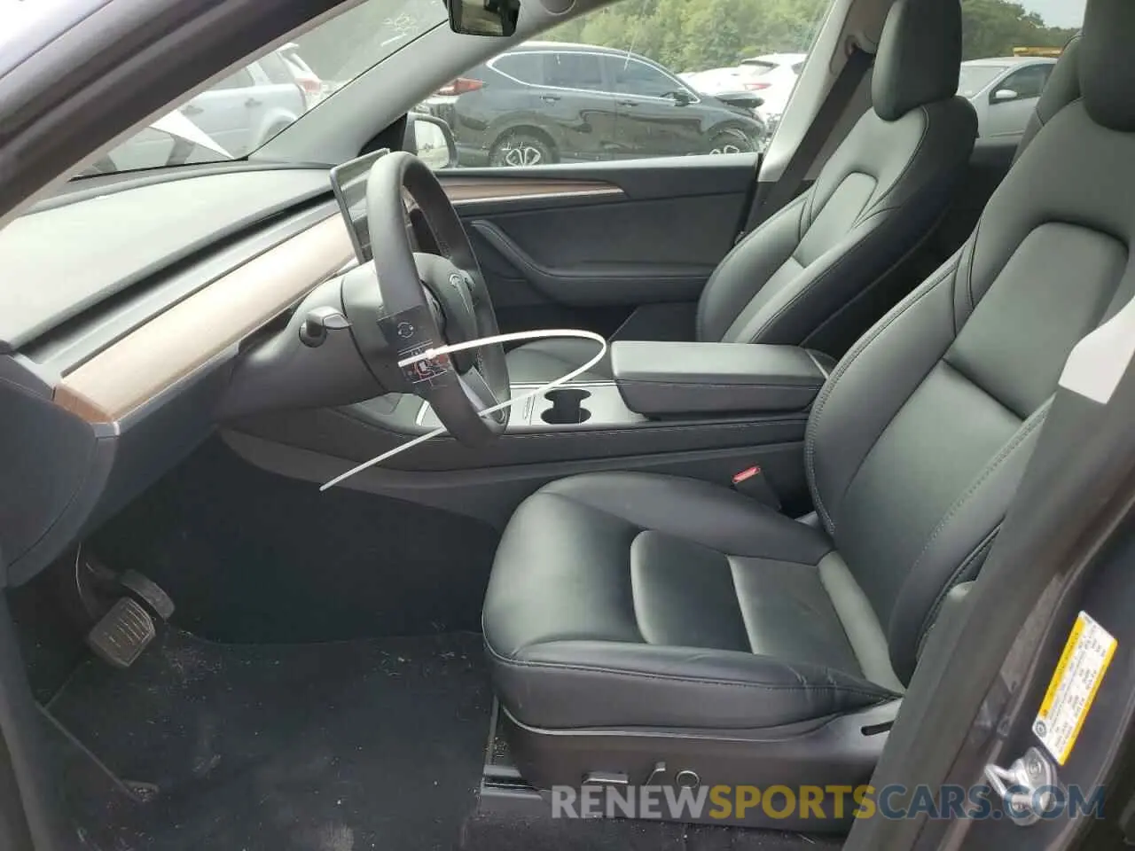 7 Photograph of a damaged car 7SAYGAEE5PF669999 TESLA MODEL Y 2023