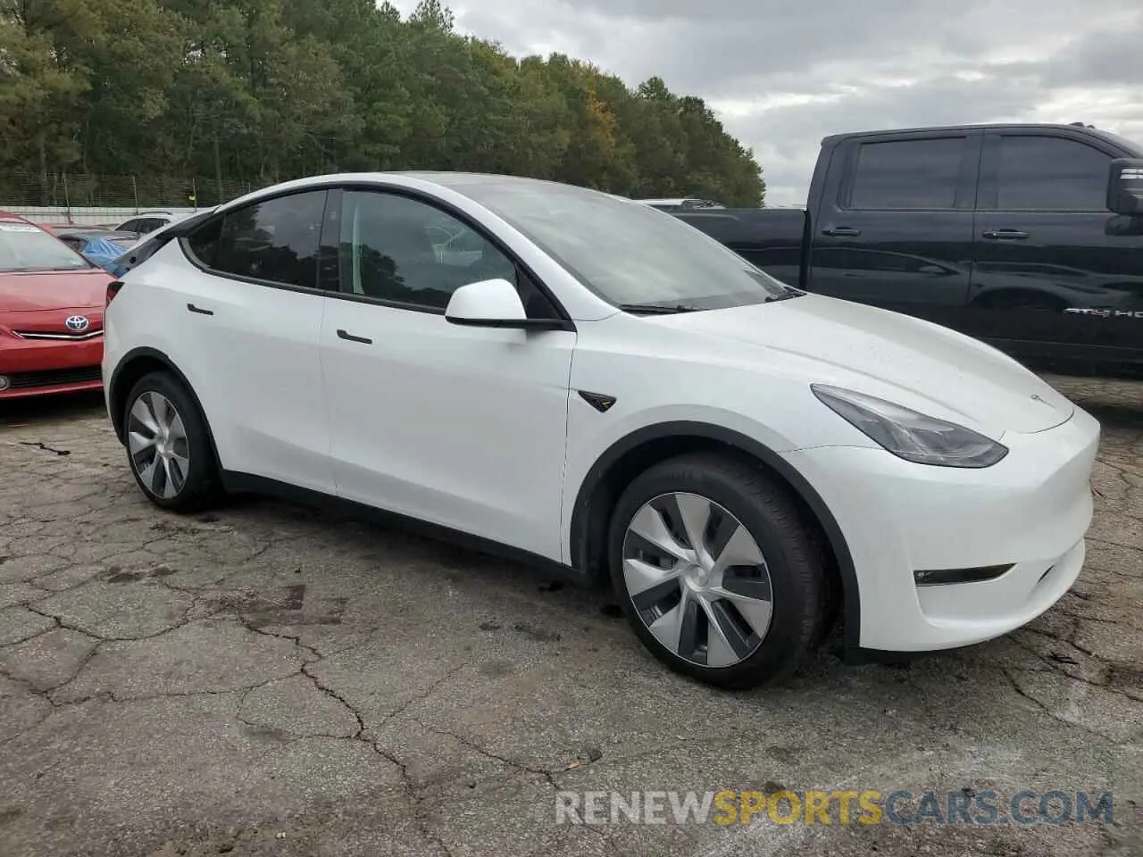 4 Photograph of a damaged car 7SAYGAEE5PF799717 TESLA MODEL Y 2023