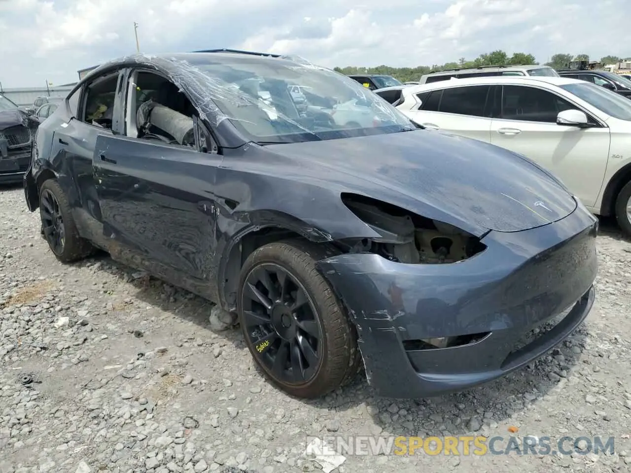 4 Photograph of a damaged car 7SAYGAEE5PF906457 TESLA MODEL Y 2023