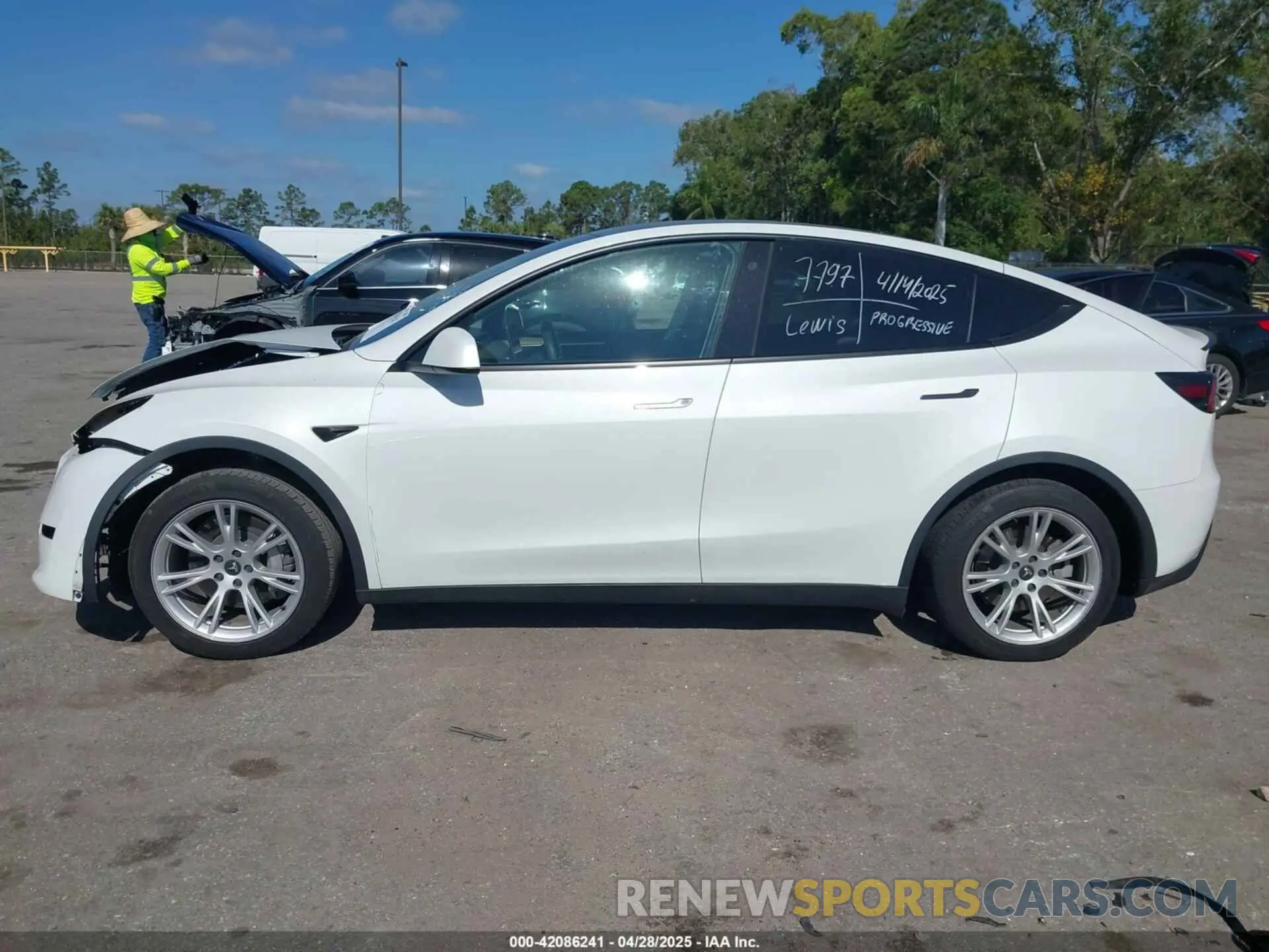 15 Photograph of a damaged car 7SAYGAEE7PF588681 TESLA MODEL Y 2023