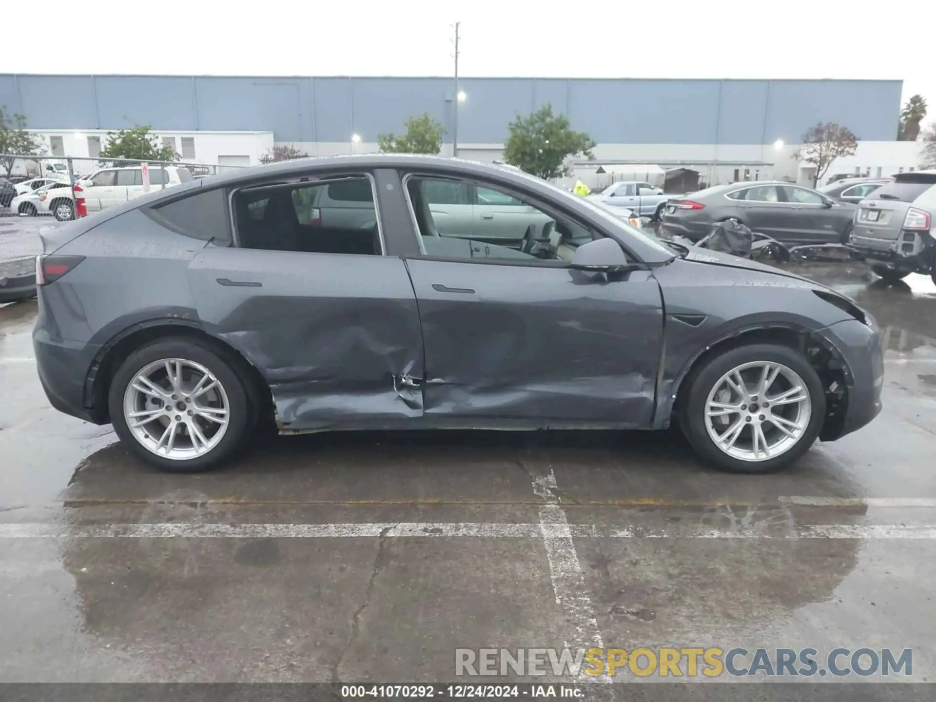14 Photograph of a damaged car 7SAYGAEE7PF623932 TESLA MODEL Y 2023