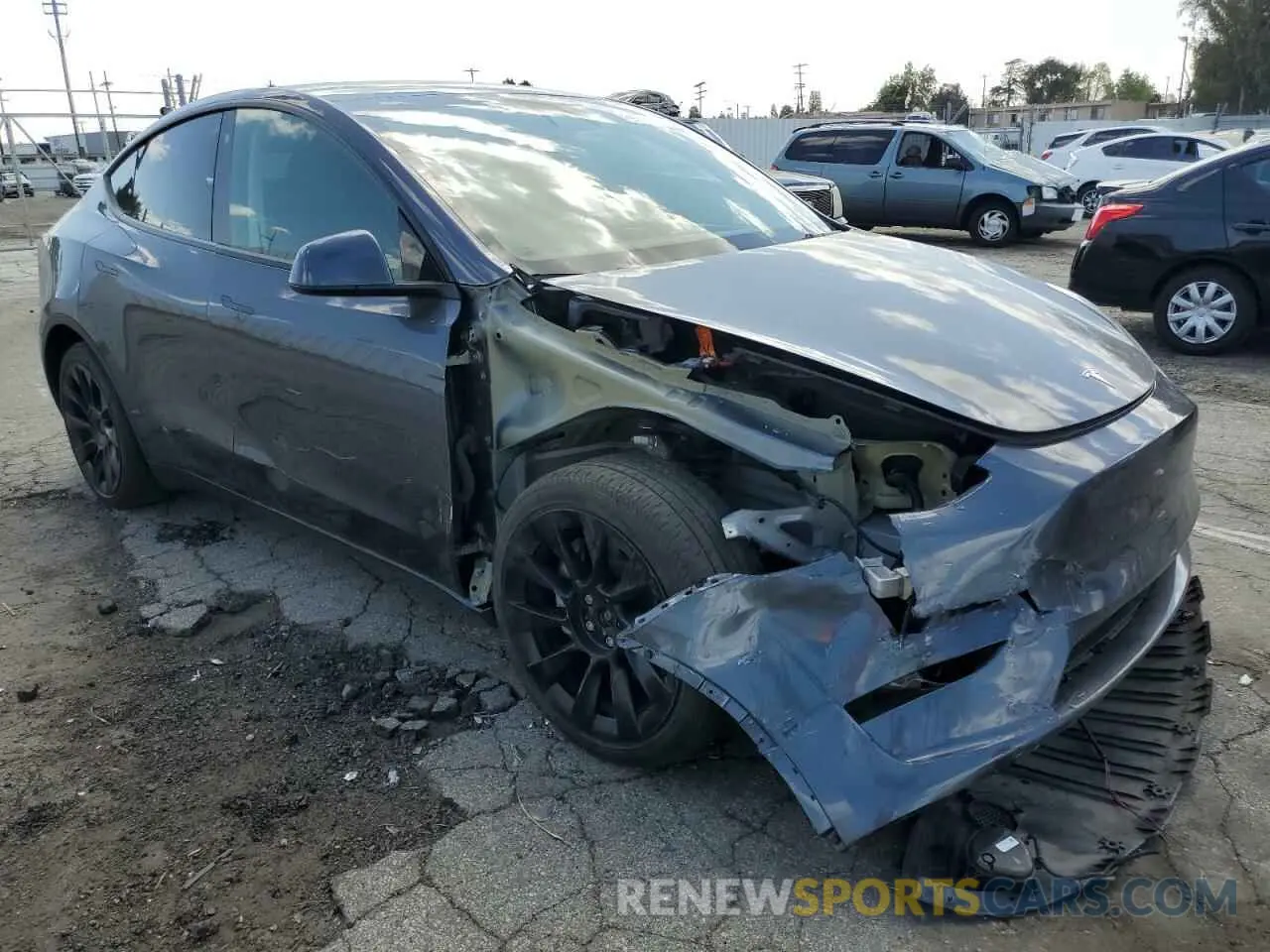 4 Photograph of a damaged car 7SAYGAEE7PF714828 TESLA MODEL Y 2023