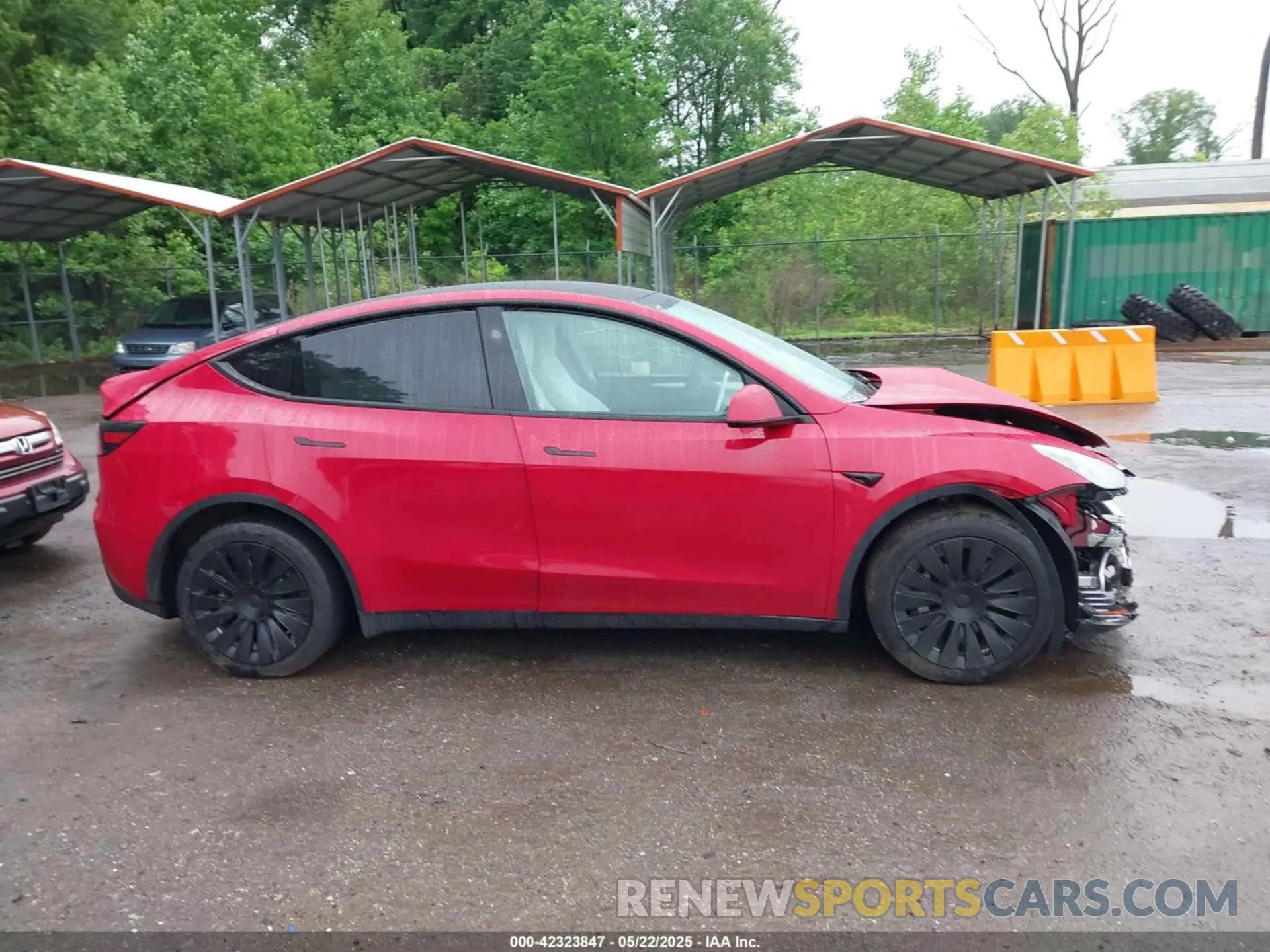12 Photograph of a damaged car 7SAYGAEE7PF800978 TESLA MODEL Y 2023