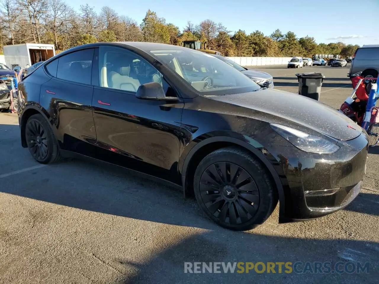 4 Photograph of a damaged car 7SAYGAEE7PF896899 TESLA MODEL Y 2023