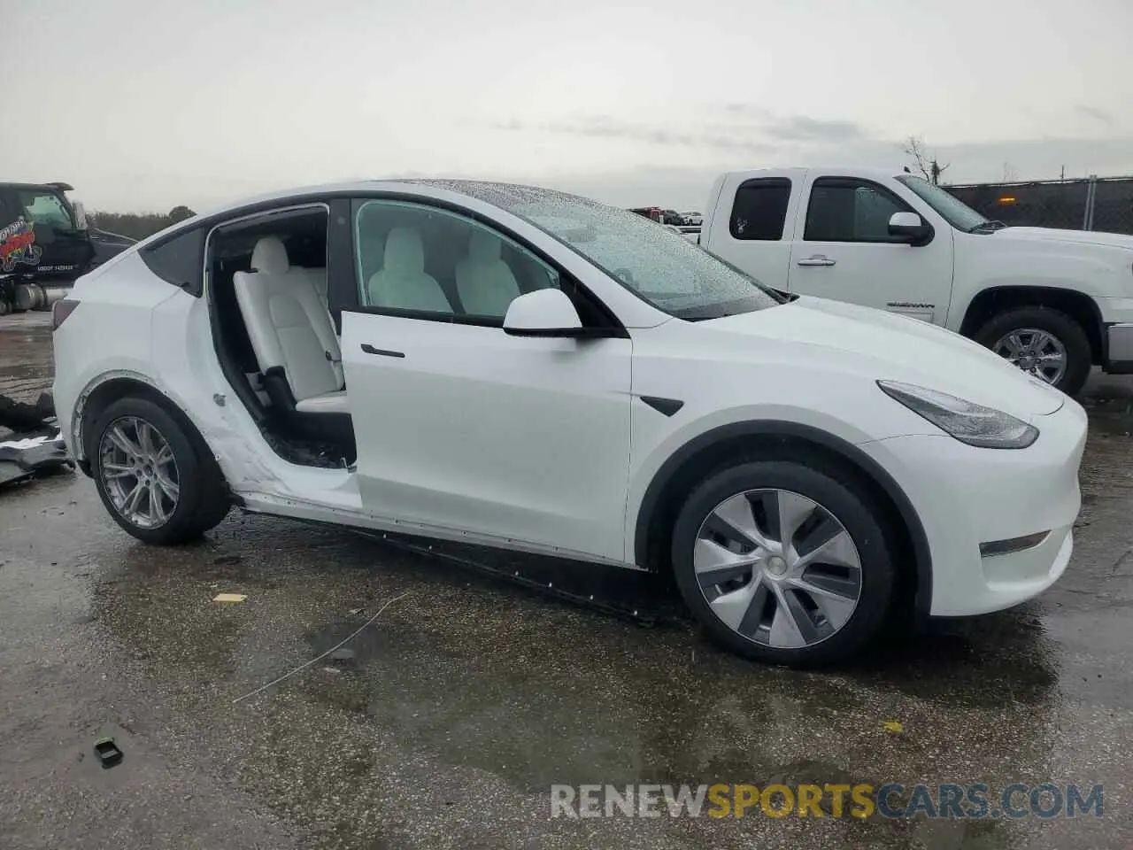 4 Фотография поврежденного автомобиля 7SAYGAEE8PF599740 TESLA MODEL Y 2023