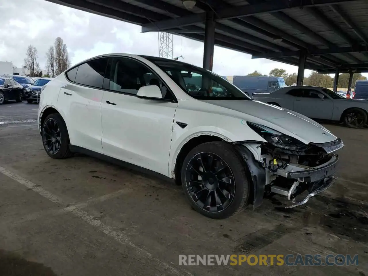 4 Photograph of a damaged car 7SAYGAEE8PF622093 TESLA MODEL Y 2023