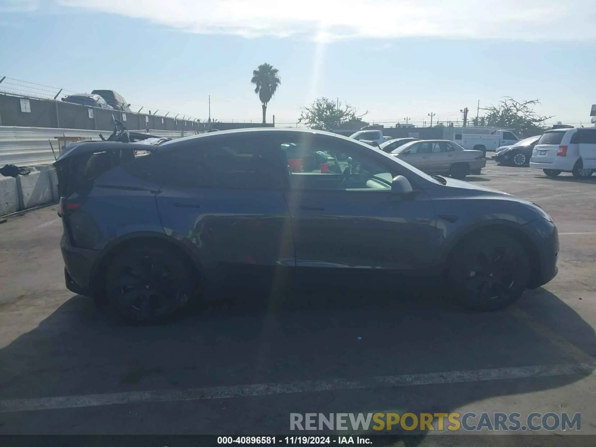 12 Photograph of a damaged car 7SAYGAEE8PF623860 TESLA MODEL Y 2023
