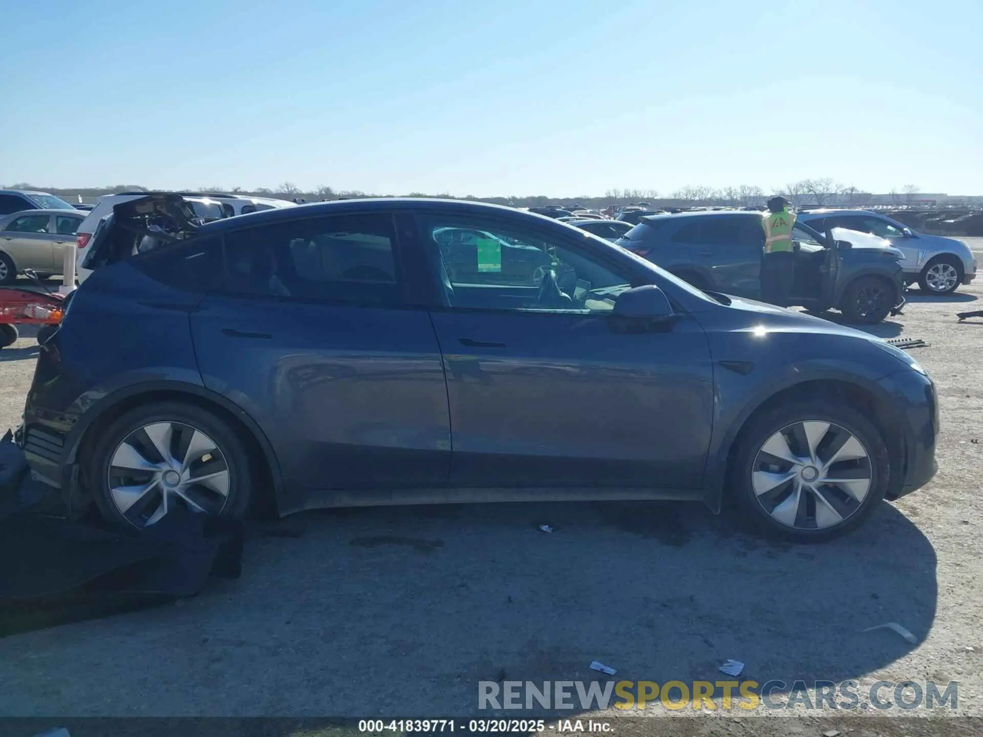 12 Photograph of a damaged car 7SAYGAEE8PF667728 TESLA MODEL Y 2023