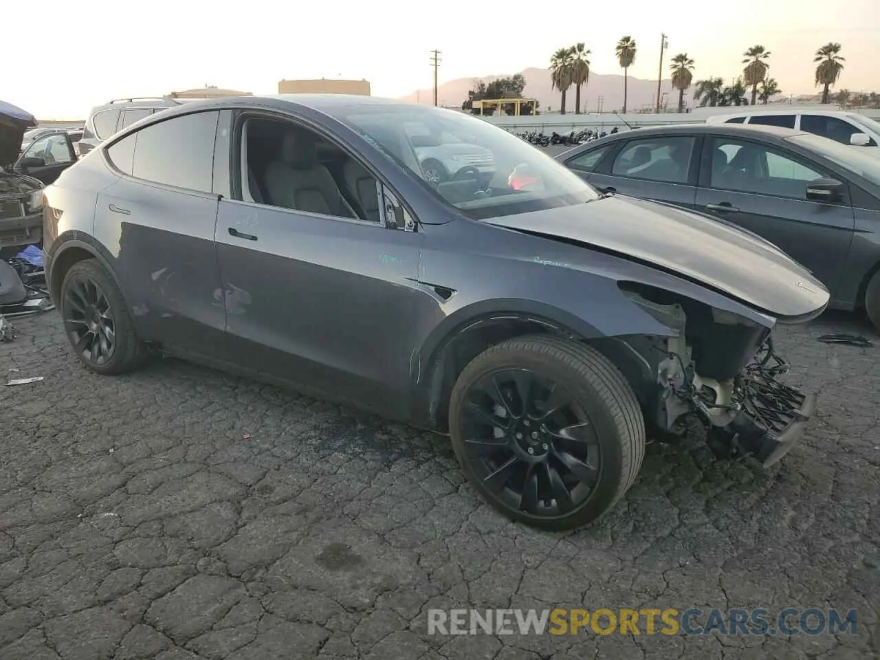 4 Photograph of a damaged car 7SAYGAEE8PF980052 TESLA MODEL Y 2023