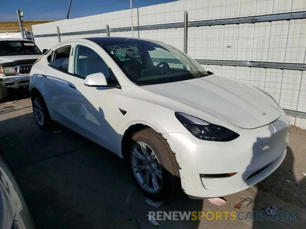 4 Photograph of a damaged car 7SAYGAEEXPF922668 TESLA MODEL Y 2023
