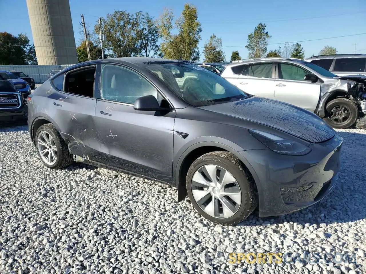 4 Photograph of a damaged car 7SAYGAEEXPF979422 TESLA MODEL Y 2023