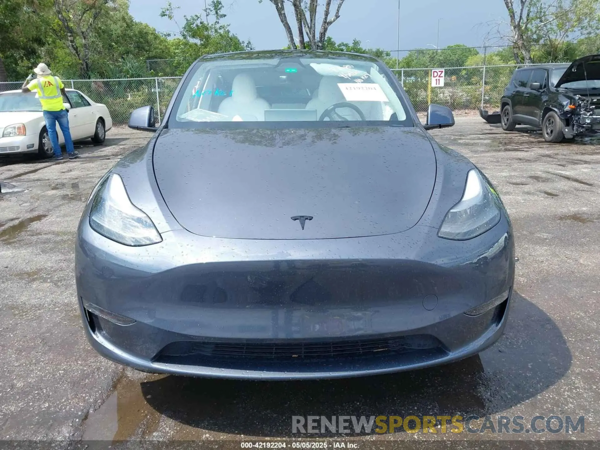 12 Photograph of a damaged car 7SAYGDED0PF947510 TESLA MODEL Y 2023