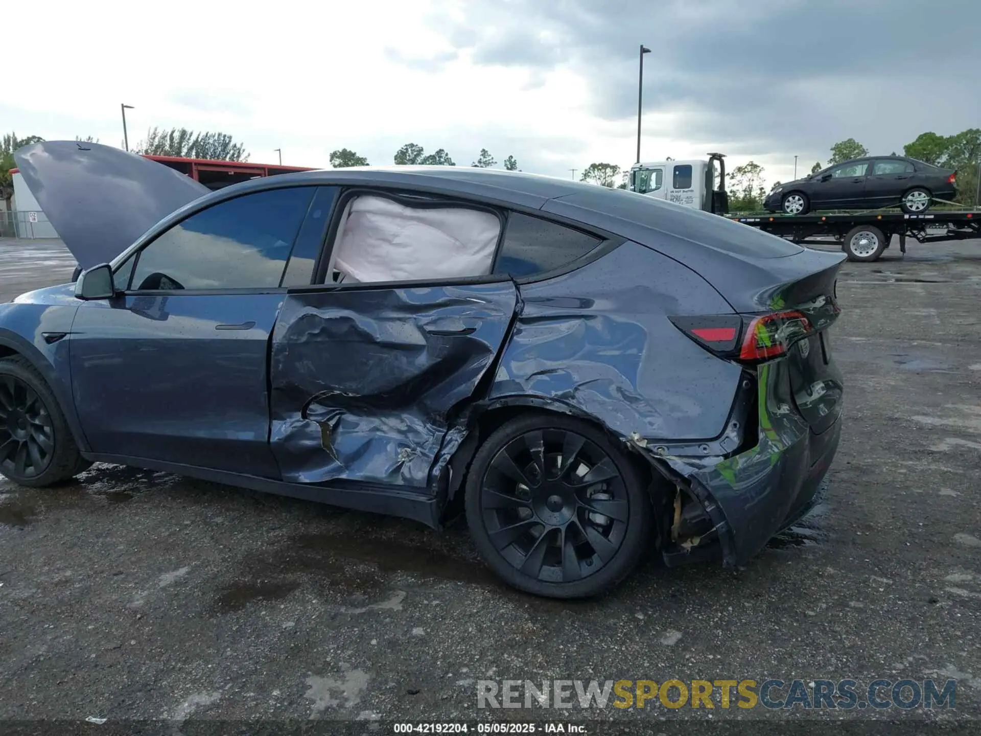 6 Photograph of a damaged car 7SAYGDED0PF947510 TESLA MODEL Y 2023