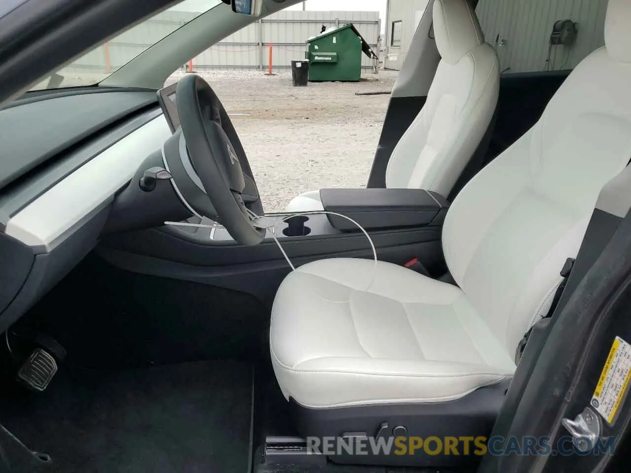 7 Photograph of a damaged car 7SAYGDED1PF913589 TESLA MODEL Y 2023
