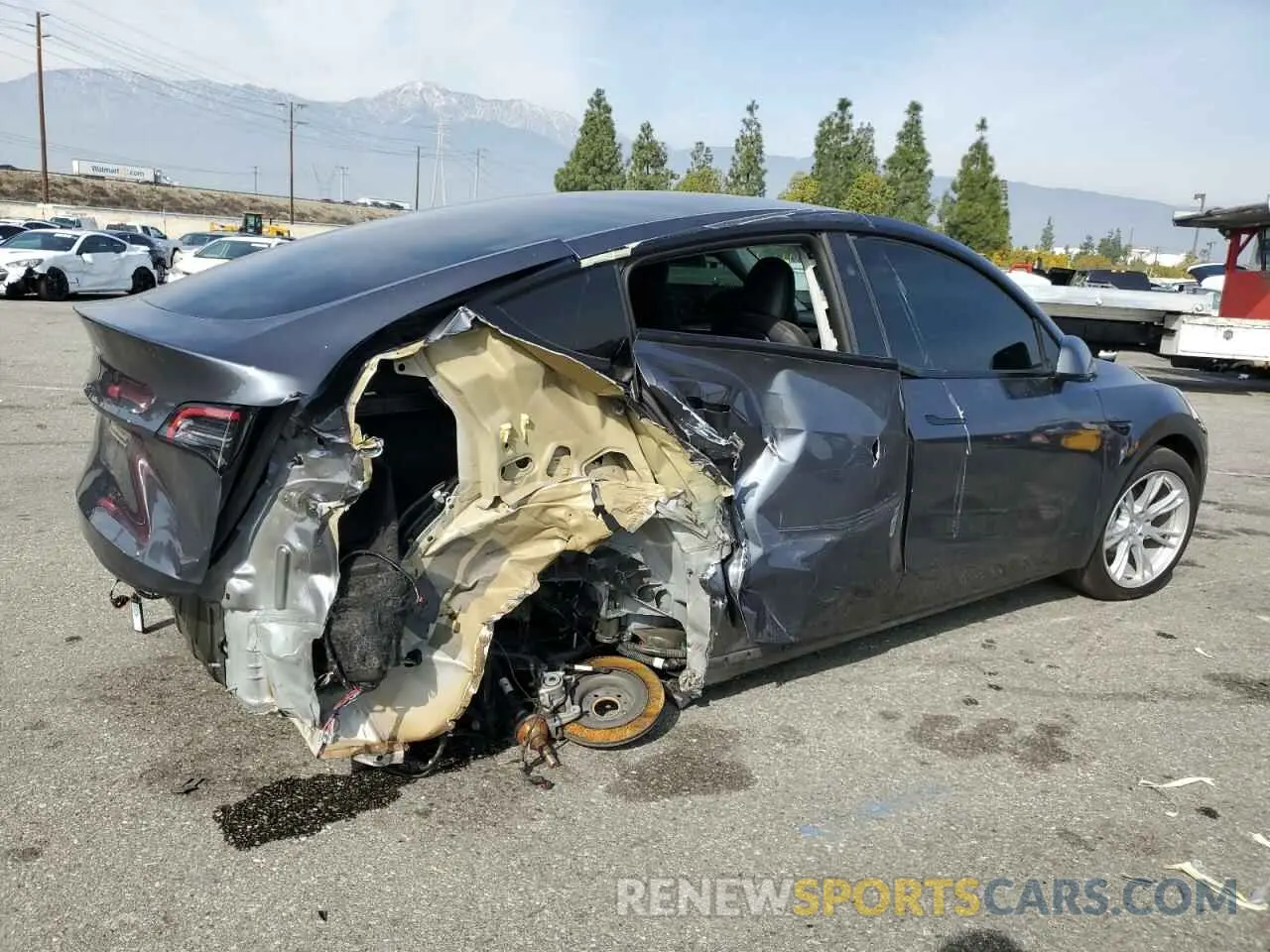 3 Photograph of a damaged car 7SAYGDED1PF979995 TESLA MODEL Y 2023