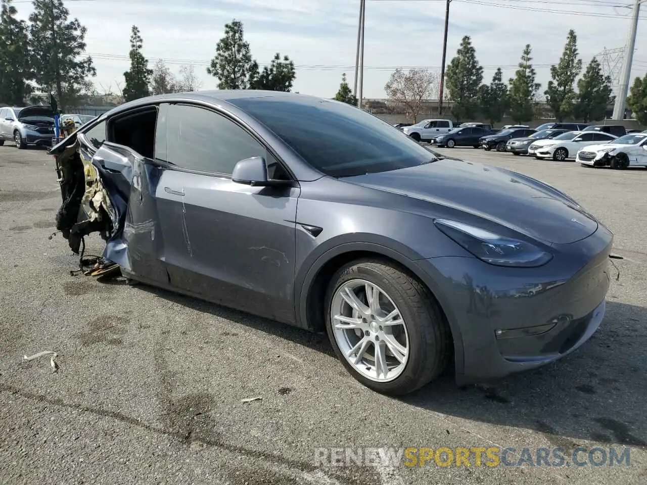 4 Photograph of a damaged car 7SAYGDED1PF979995 TESLA MODEL Y 2023