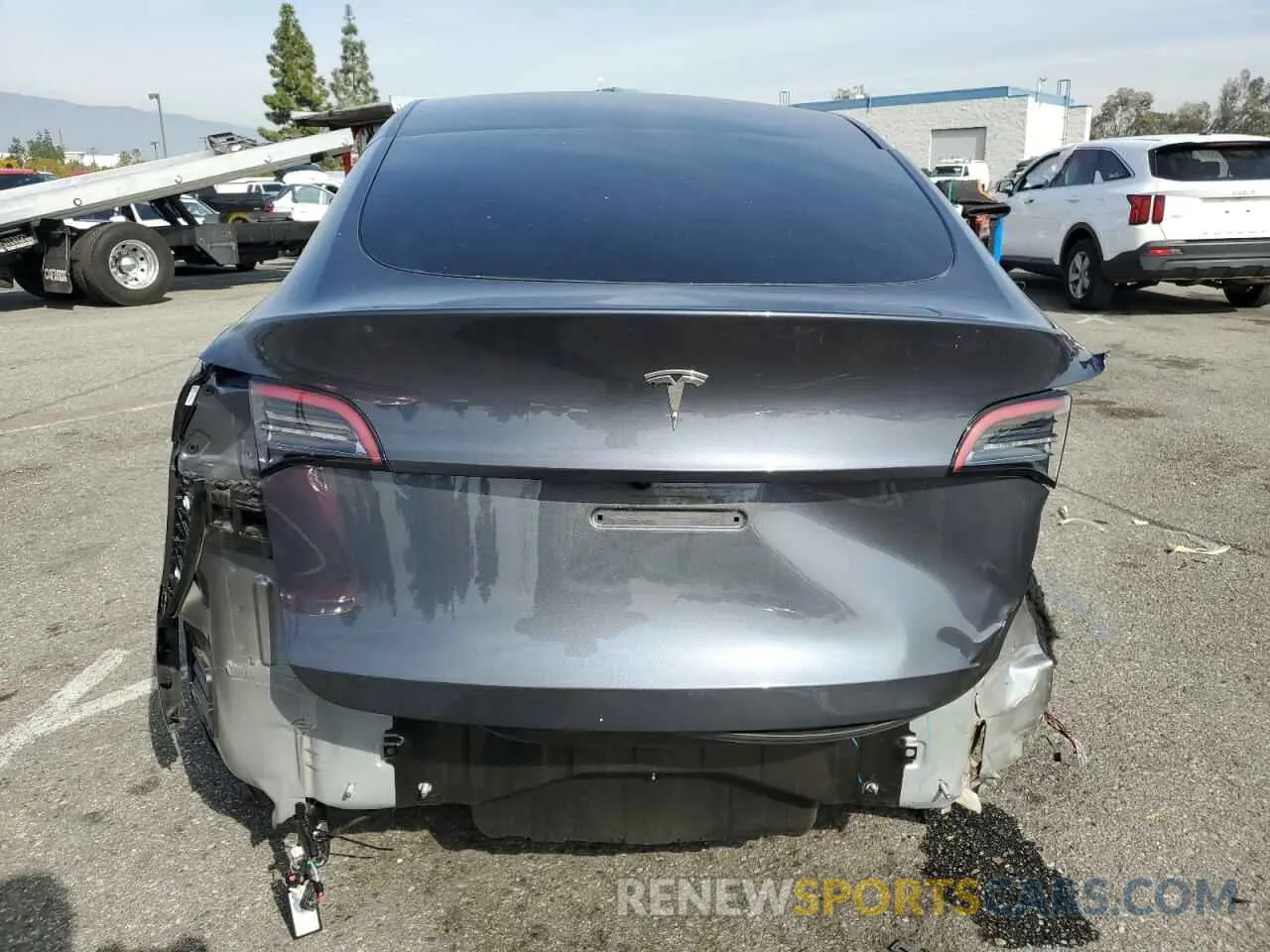 6 Photograph of a damaged car 7SAYGDED1PF979995 TESLA MODEL Y 2023
