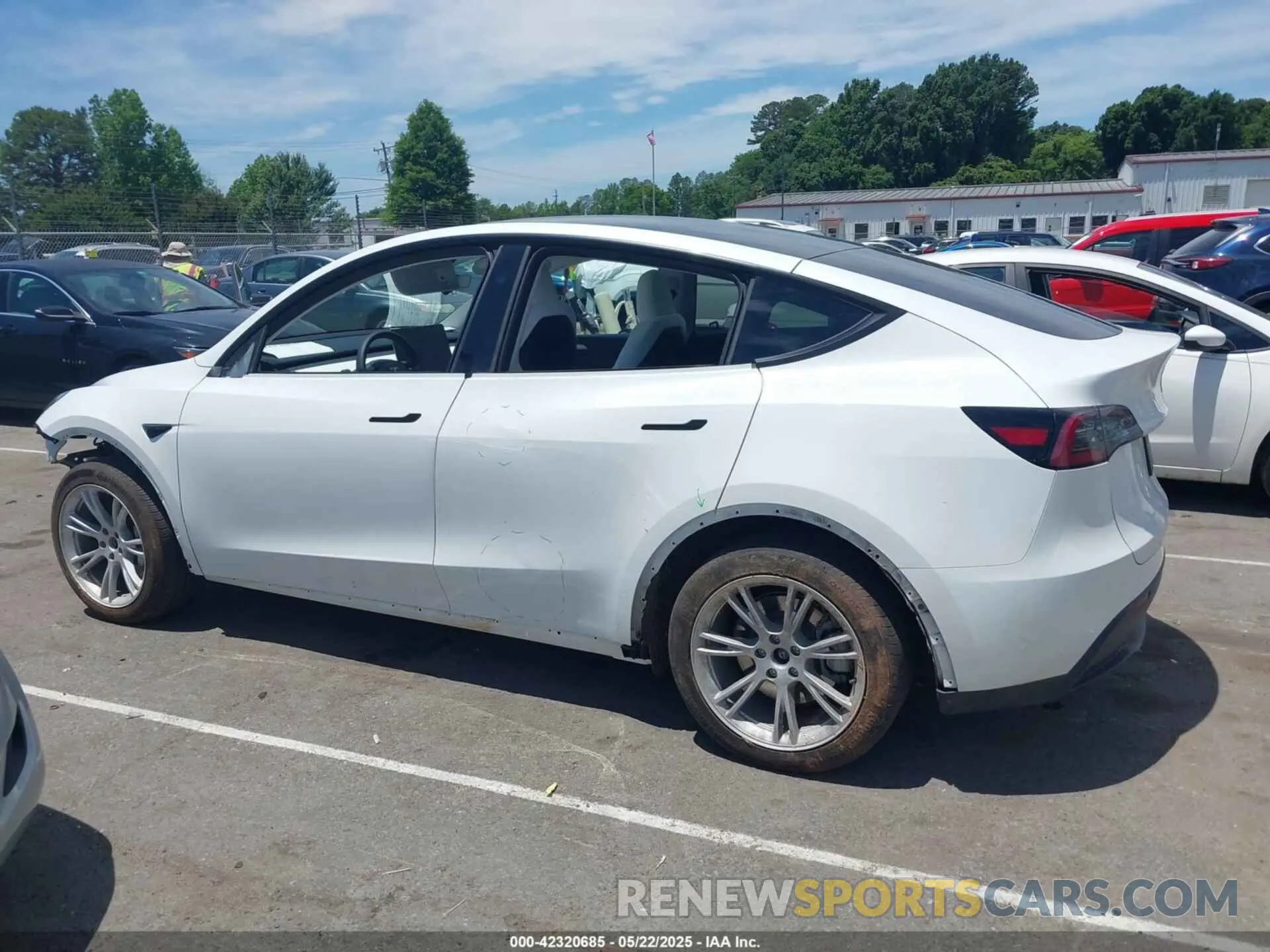 13 Photograph of a damaged car 7SAYGDED2PF931521 TESLA MODEL Y 2023