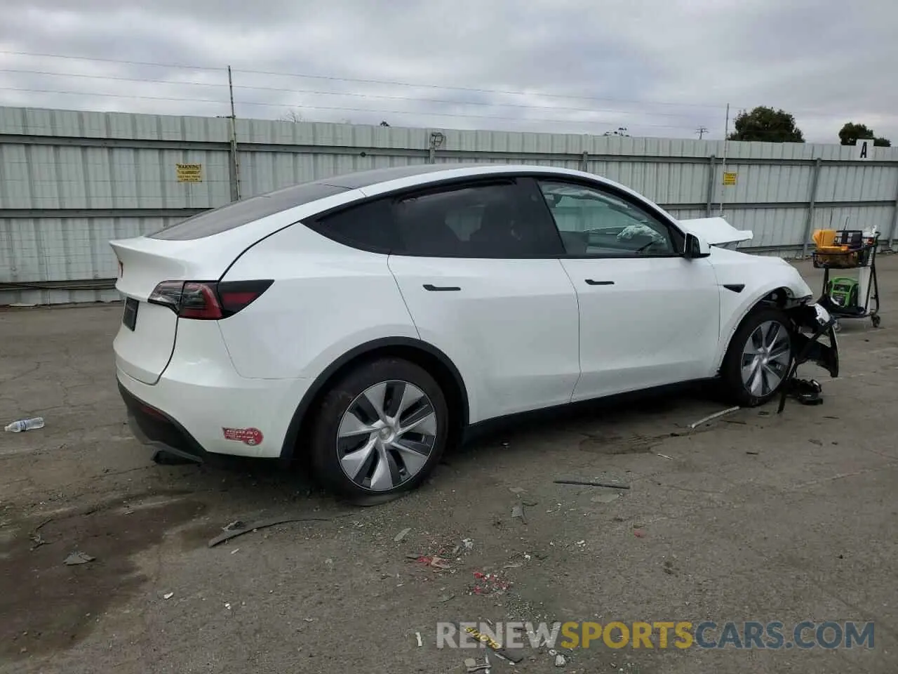 3 Photograph of a damaged car 7SAYGDED2PF956256 TESLA MODEL Y 2023