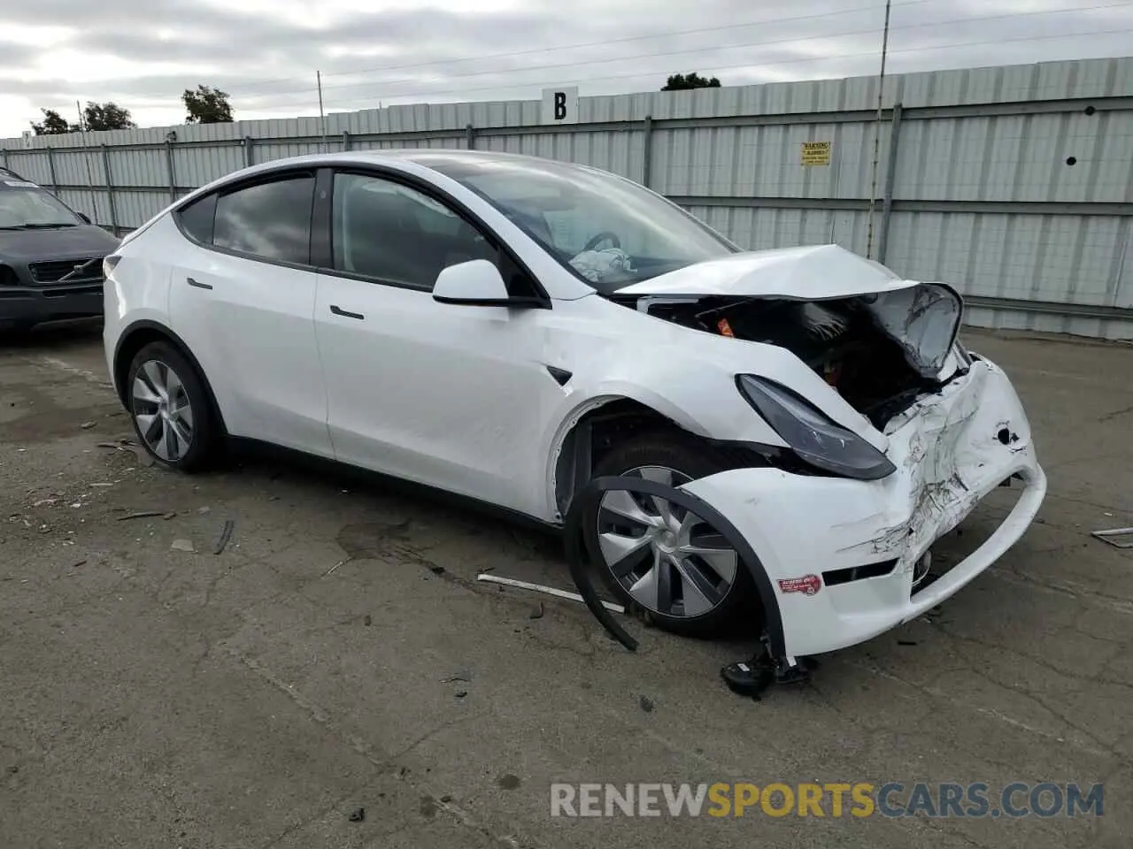 4 Photograph of a damaged car 7SAYGDED2PF956256 TESLA MODEL Y 2023