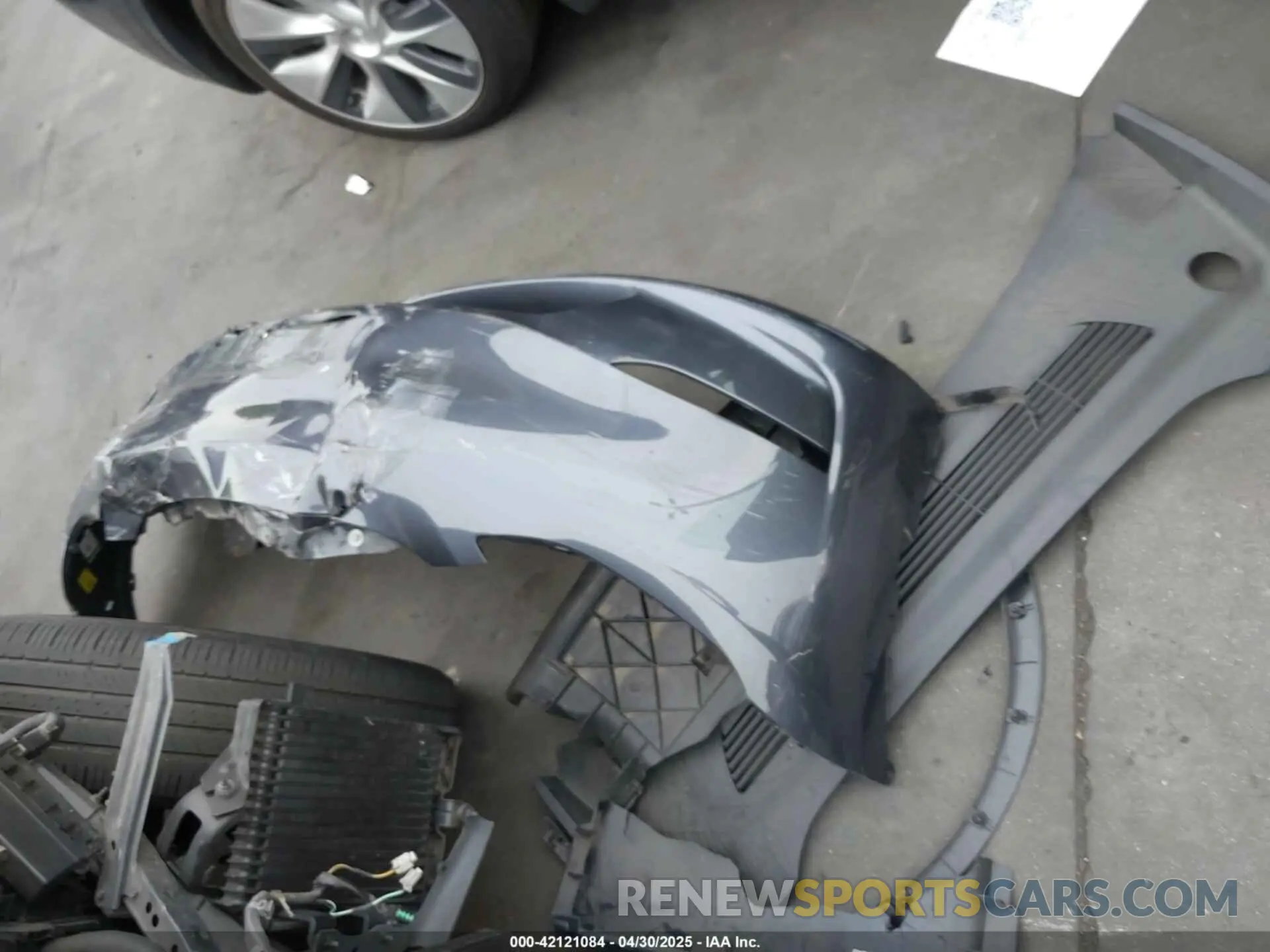 12 Photograph of a damaged car 7SAYGDED3PF962583 TESLA MODEL Y 2023
