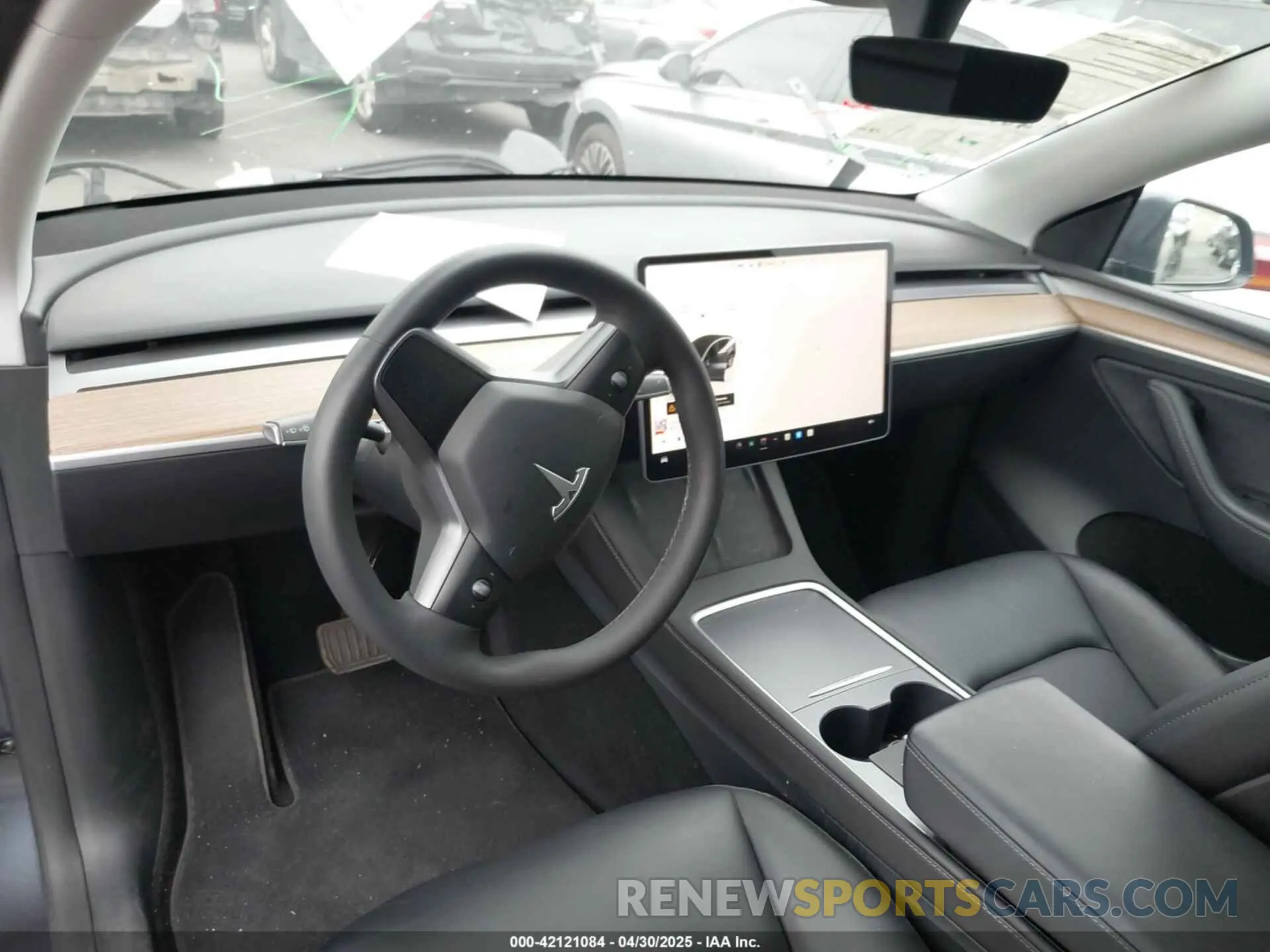 24 Photograph of a damaged car 7SAYGDED3PF962583 TESLA MODEL Y 2023