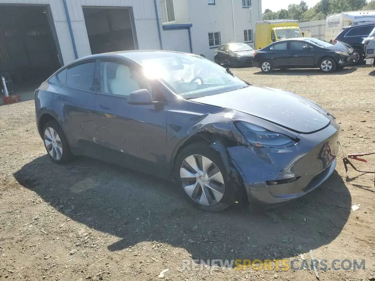 4 Photograph of a damaged car 7SAYGDED6PF930615 TESLA MODEL Y 2023