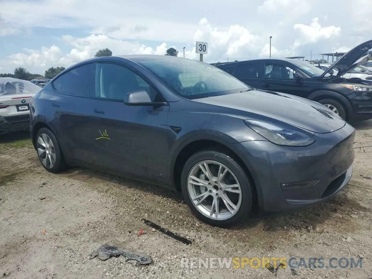4 Photograph of a damaged car 7SAYGDED6PF965218 TESLA MODEL Y 2023