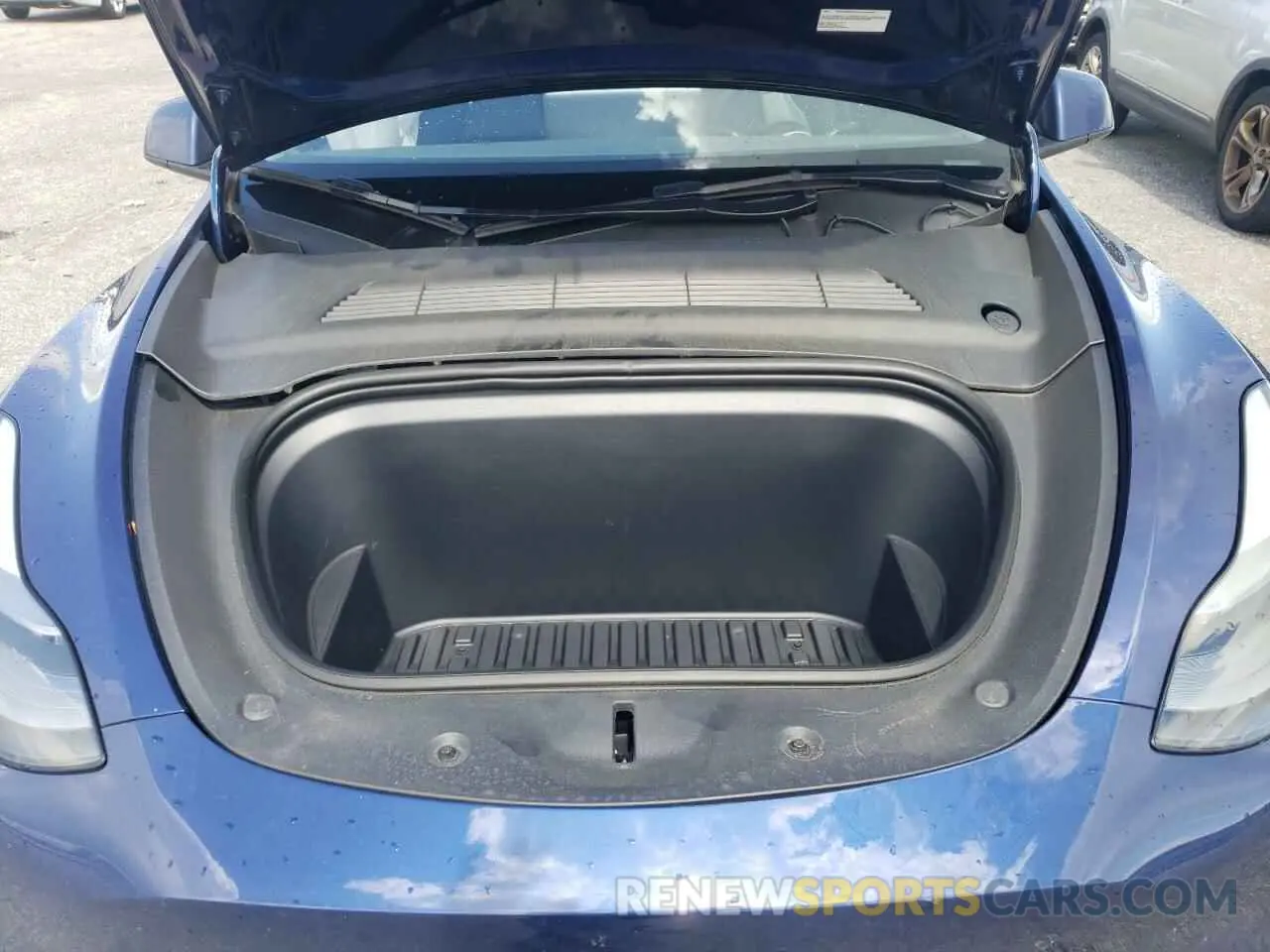 12 Photograph of a damaged car 7SAYGDEE0PF704417 TESLA MODEL Y 2023