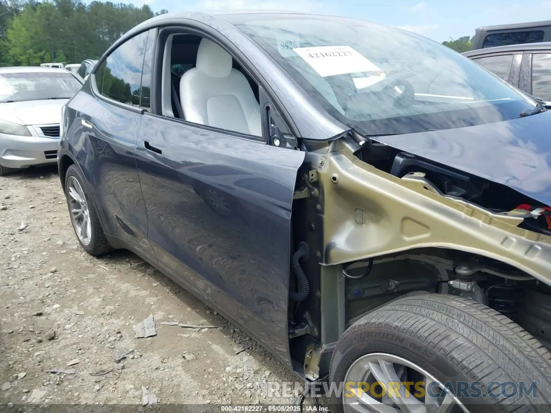 21 Photograph of a damaged car 7SAYGDEE1PA166355 TESLA MODEL Y 2023